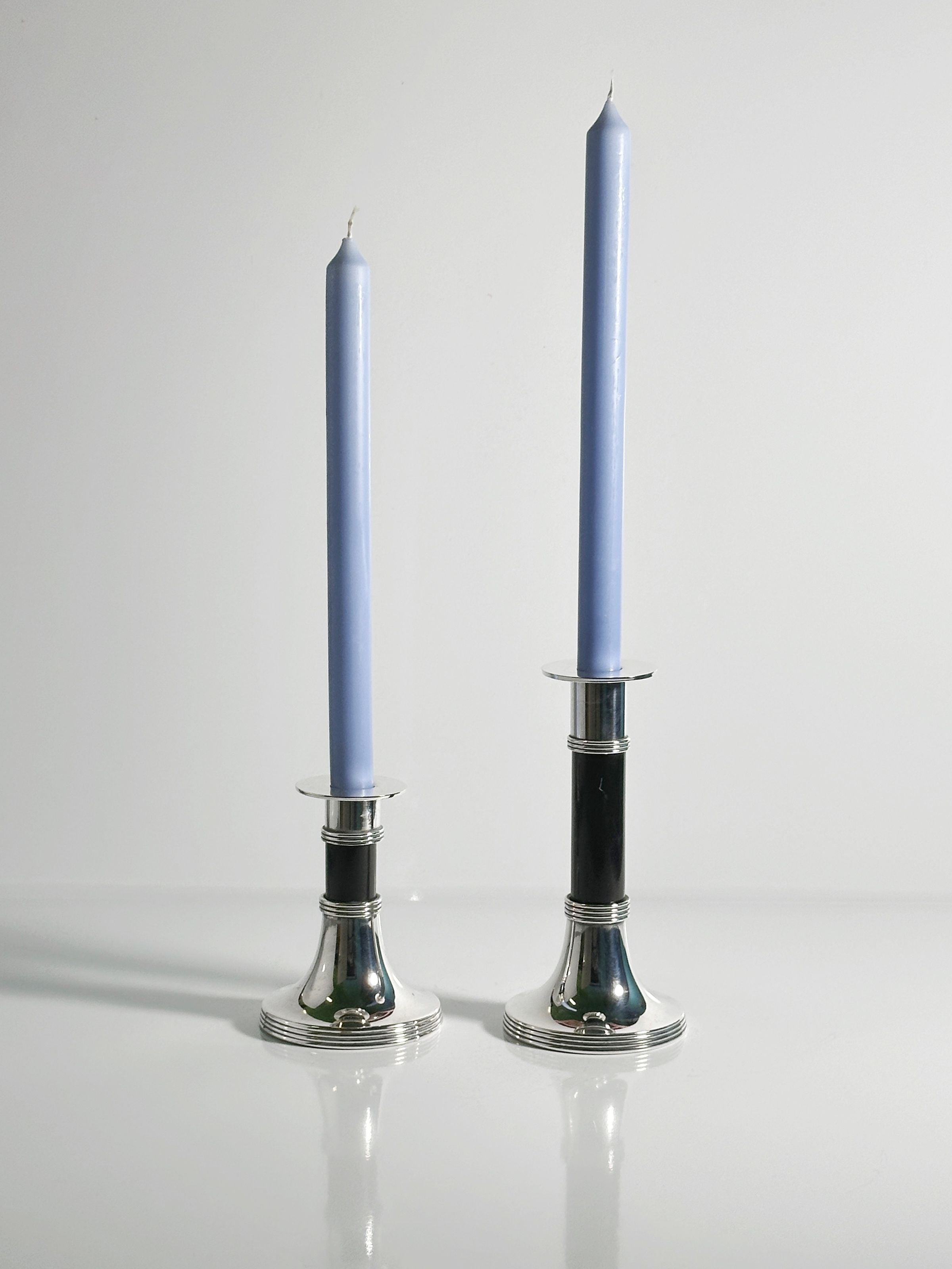Pair of Silver Plated Candleholders by Gunther Lambert — back view with blue candles