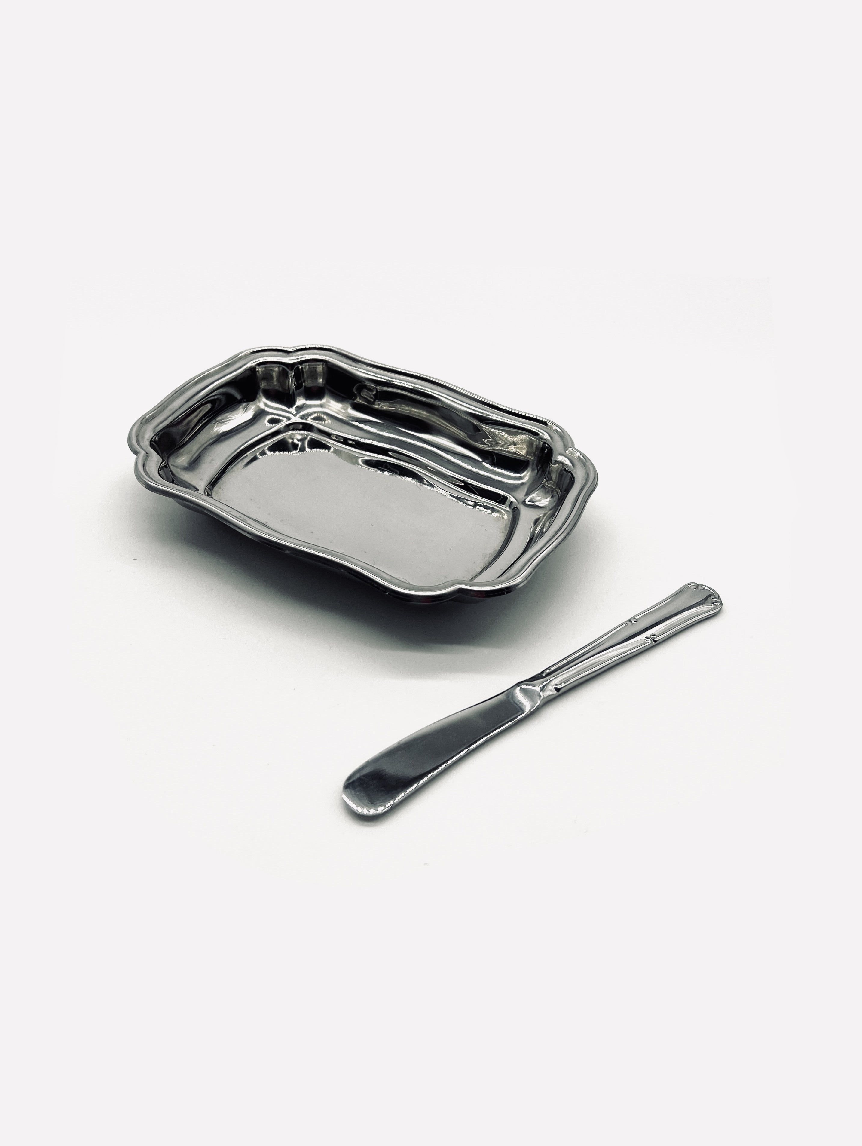 Vintage stainless steel butter dish with spreading knife