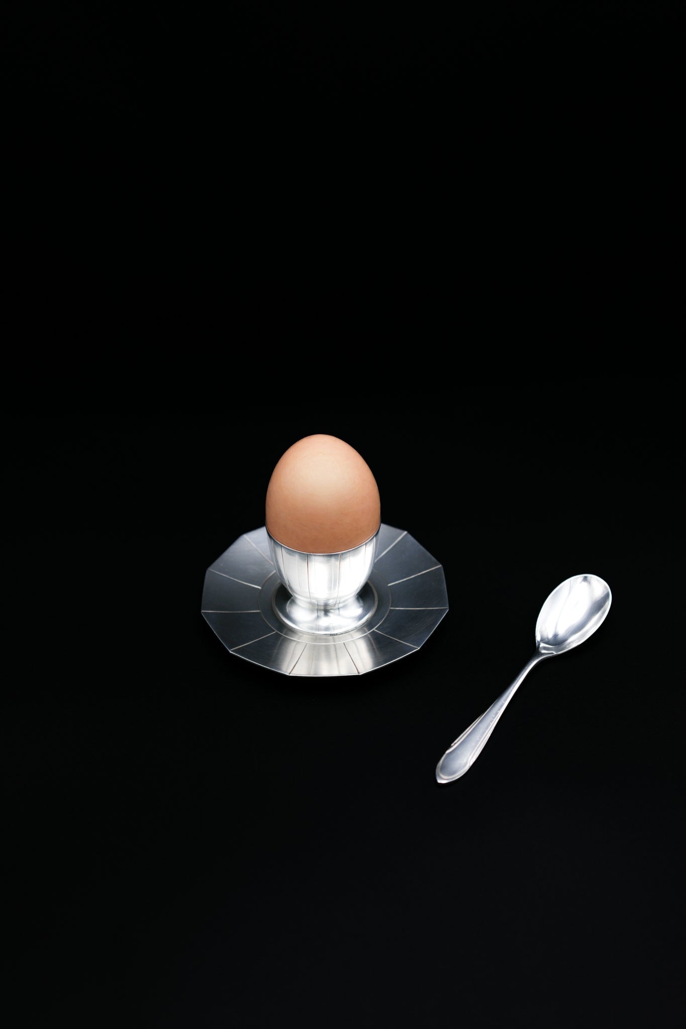Art Deco Egg Cup & Spoon by Ercuis, France, c. 1930s — close-up of clear glass cup with egg