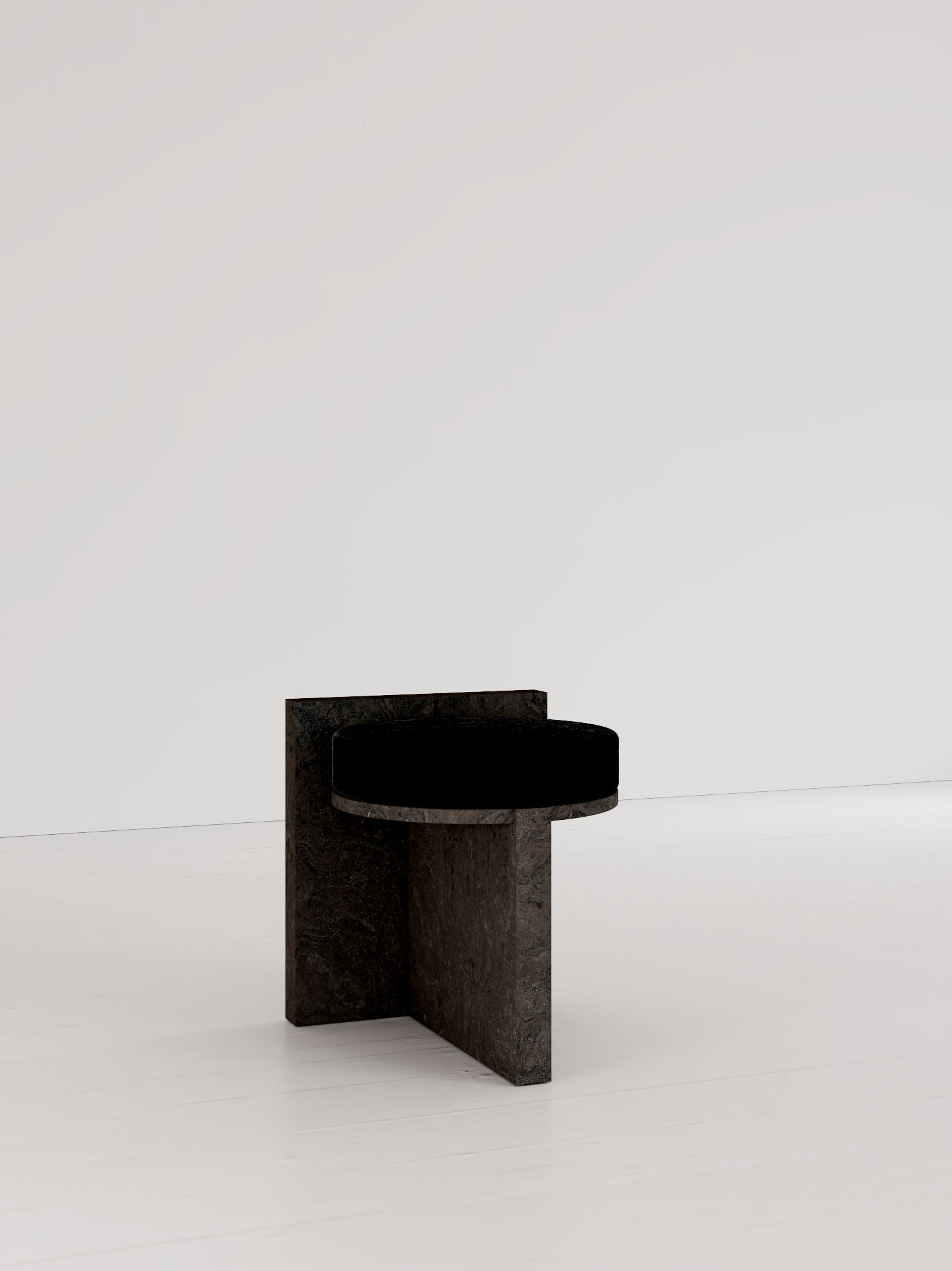 Meï 01' Stool — side view showing black stone material