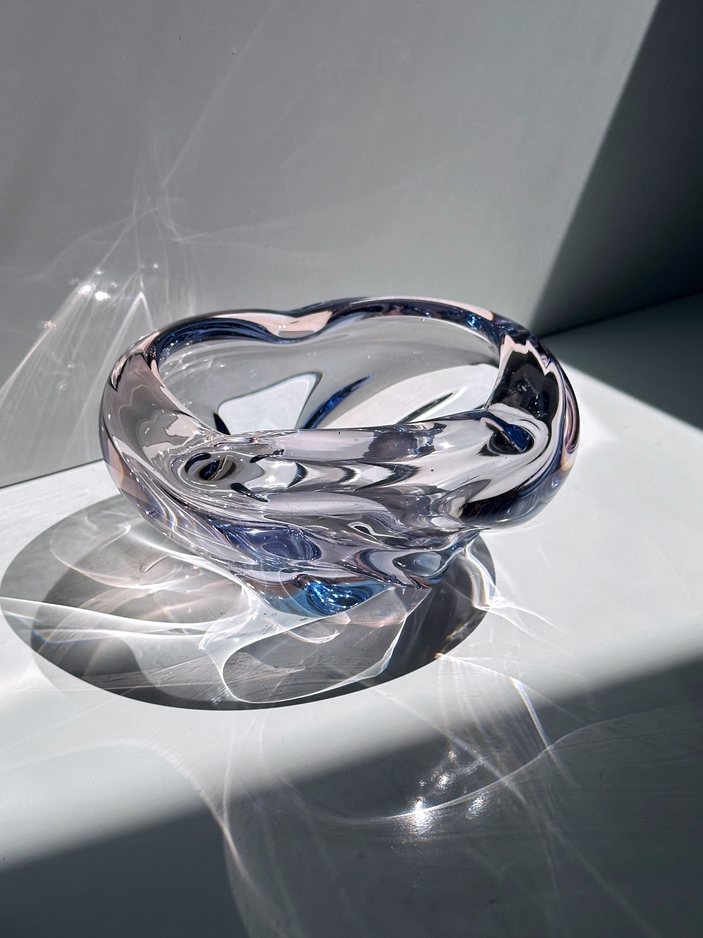 Clear glass vide-poches with blue swirled accents by Jaroslav Beranek