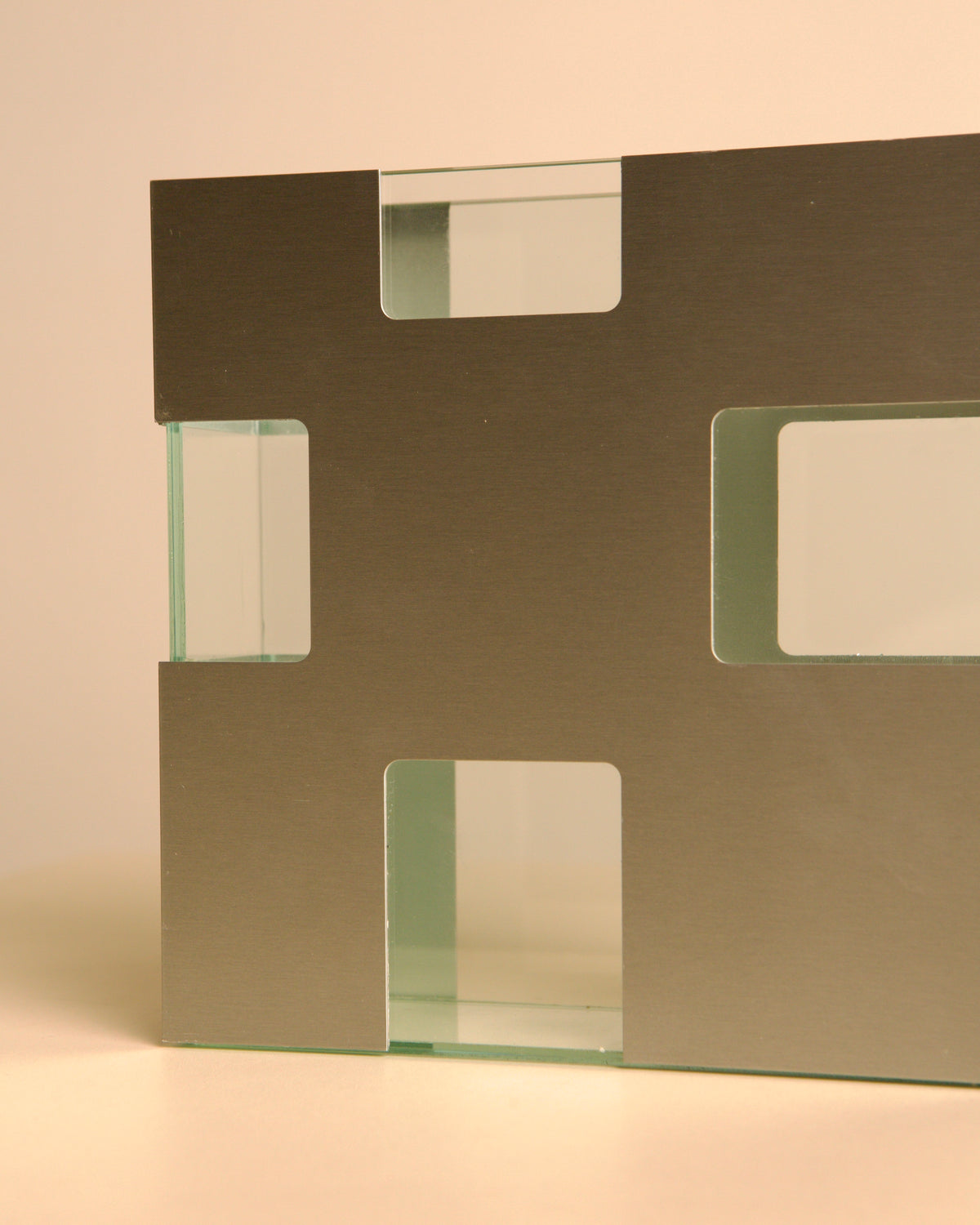 Italian brushed metal and glass vase, 1980s — close-up