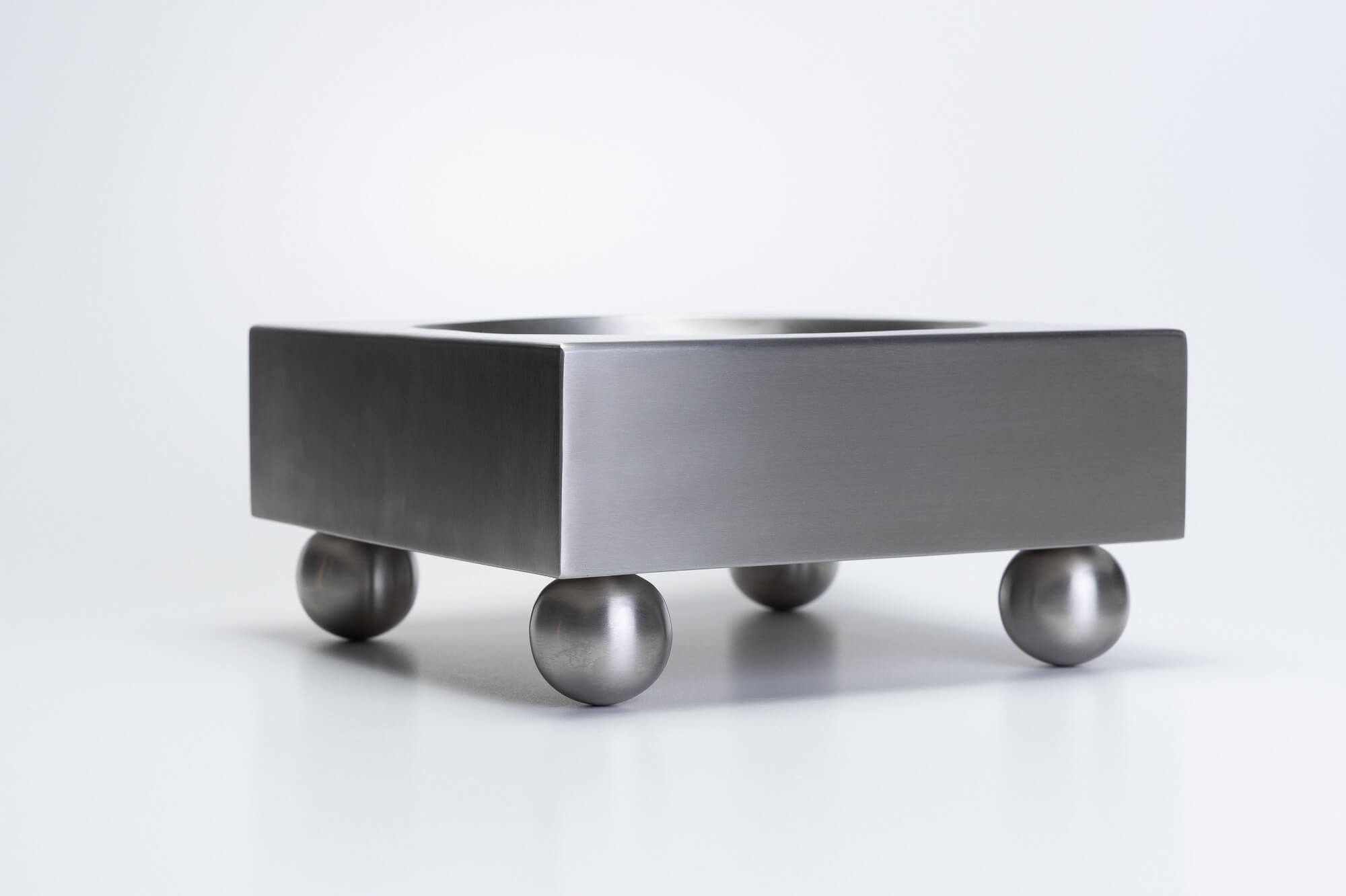 Brushed Stainless Steel Tray — side angle showing rounded feet
