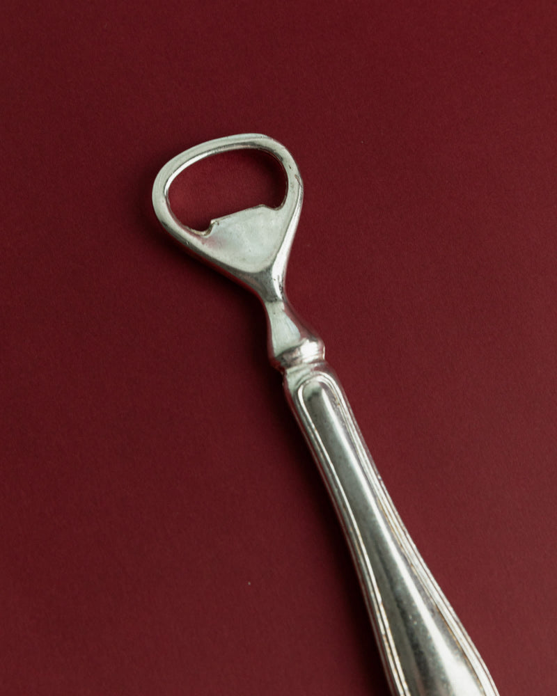Vintage 1960s Silver Plated Bottle Opener, Classic Minimal Design, Retro Bar Accessory — close-up of polished silver handle o