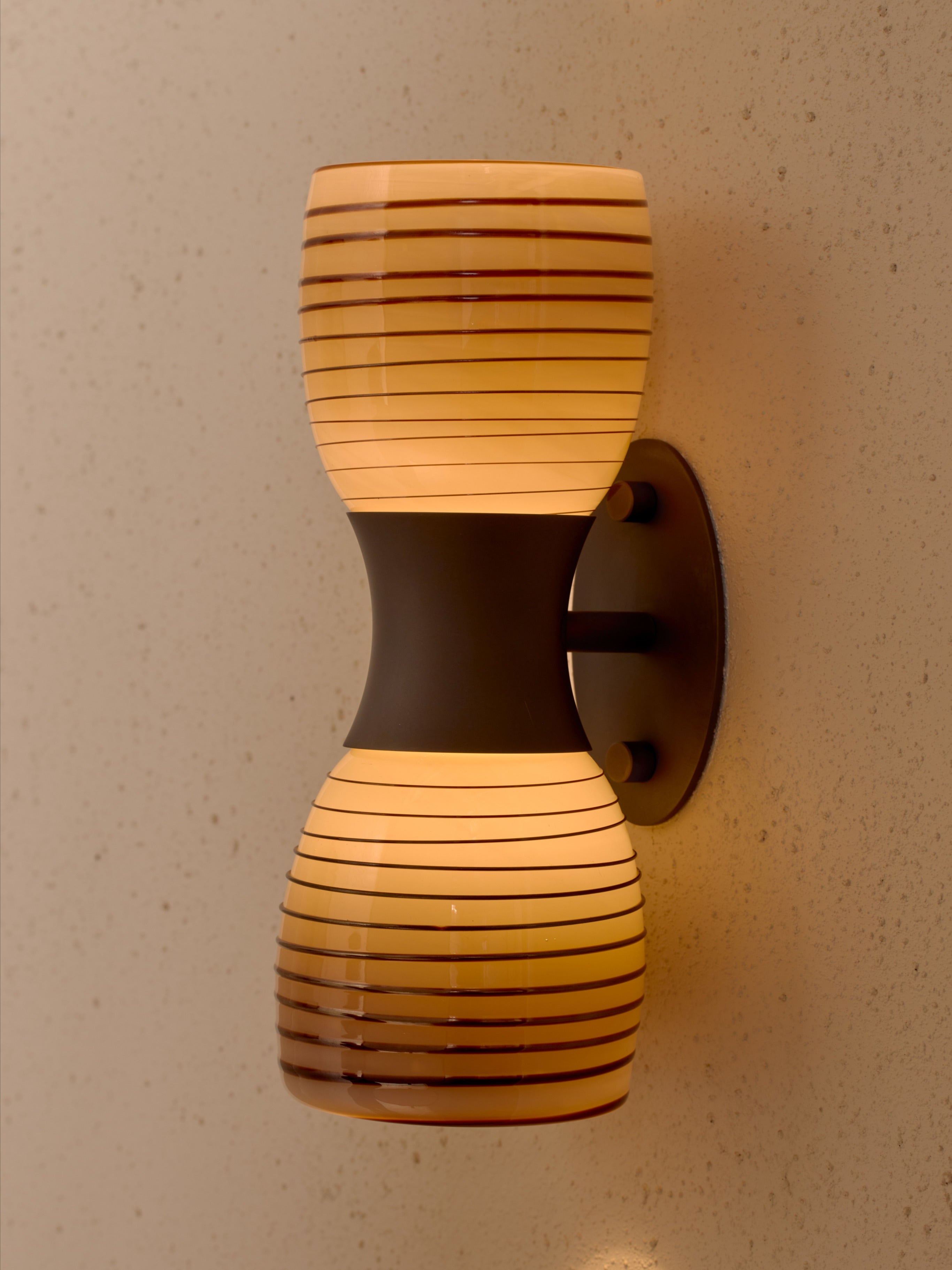 Taff Sconce in Handblown Glass and Brass — in context