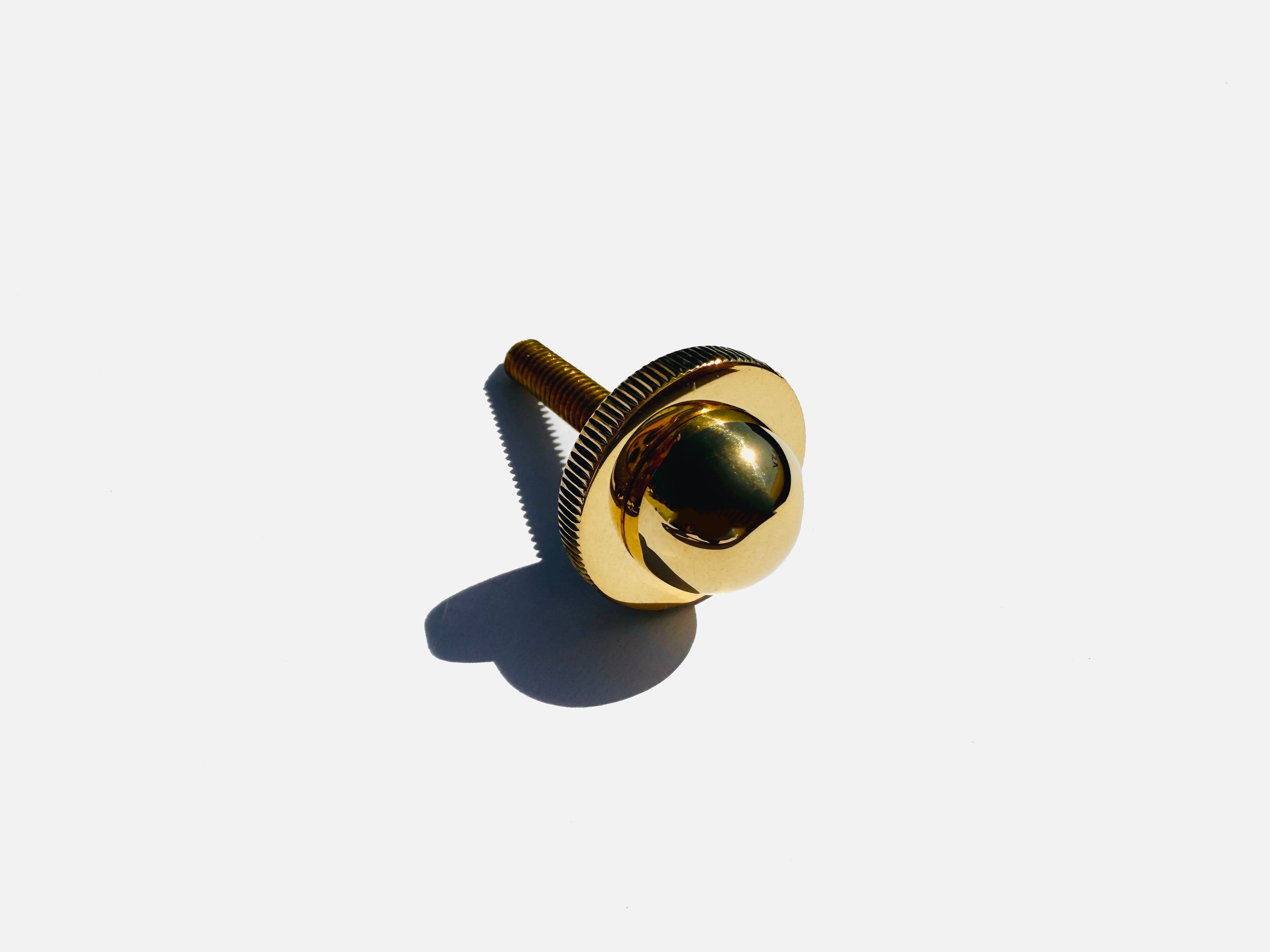 Selene Blown Glass Quartz Wall LED Wall Sconce with Brass Metal Hardware — close-up of brass hardware detail