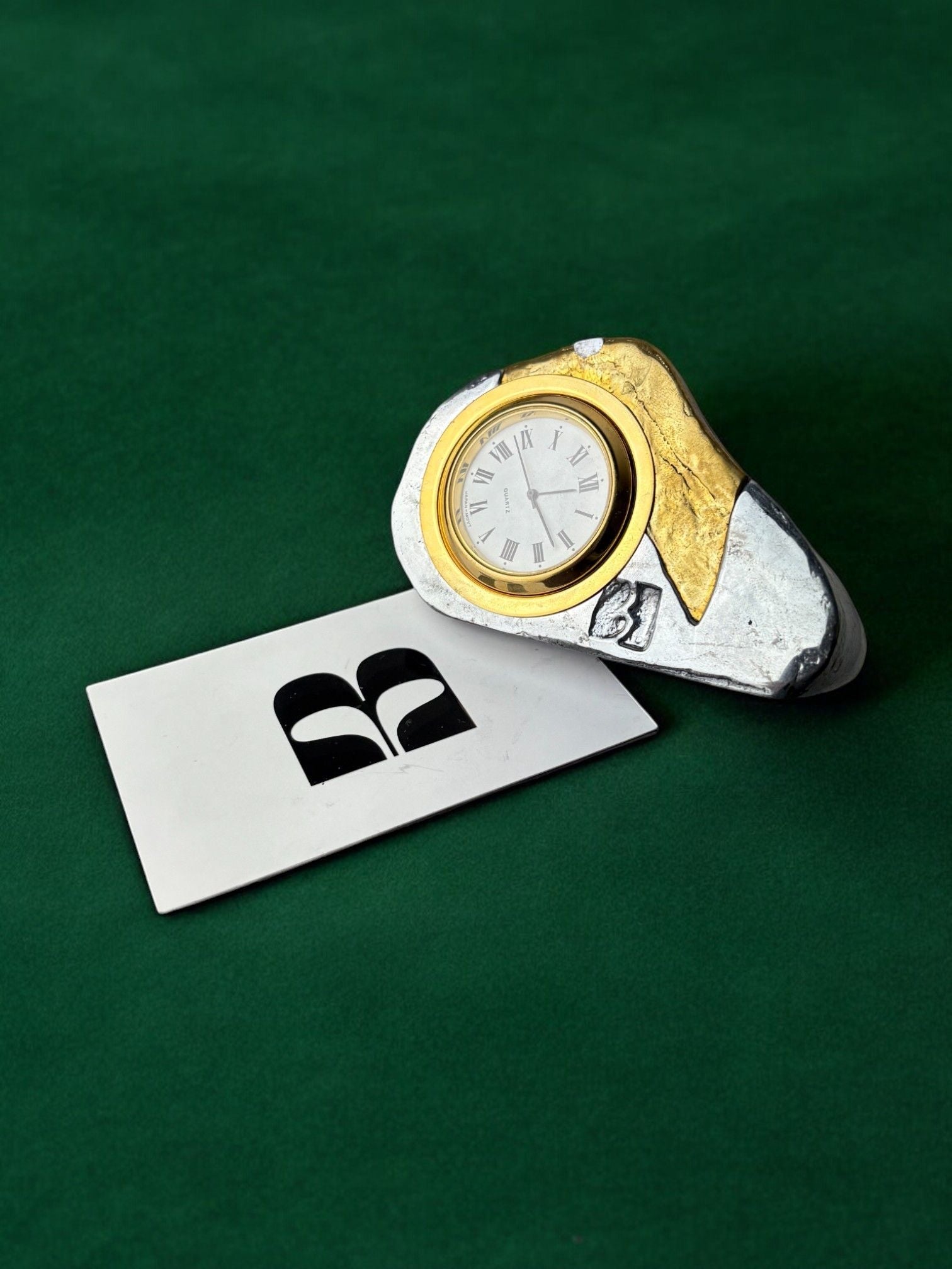Brutalist Clock by Art3, Spain, 1980s — top view on green background