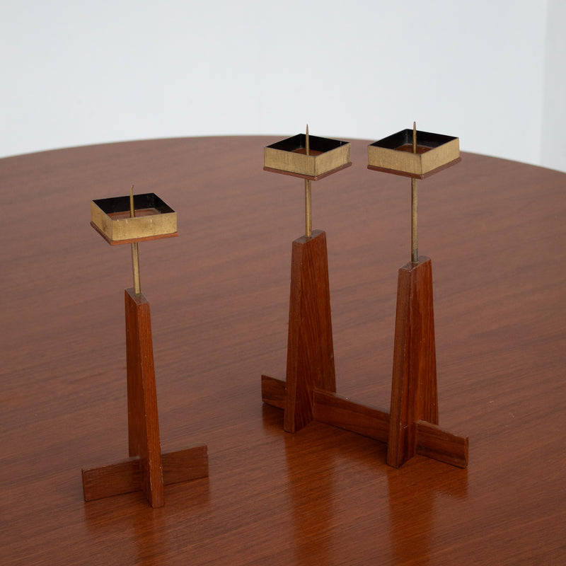 Vintage Candle Holders in Wood / Teak — close-up of wooden bases on table