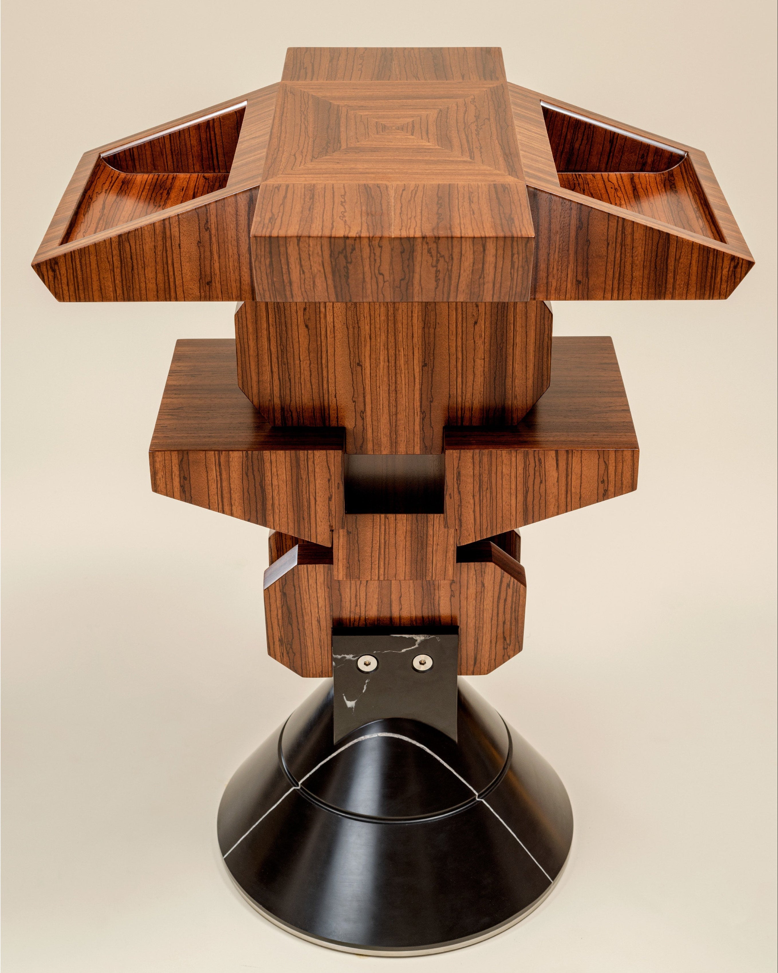 Pyramiss Pedestal Table — top view of layered wood design