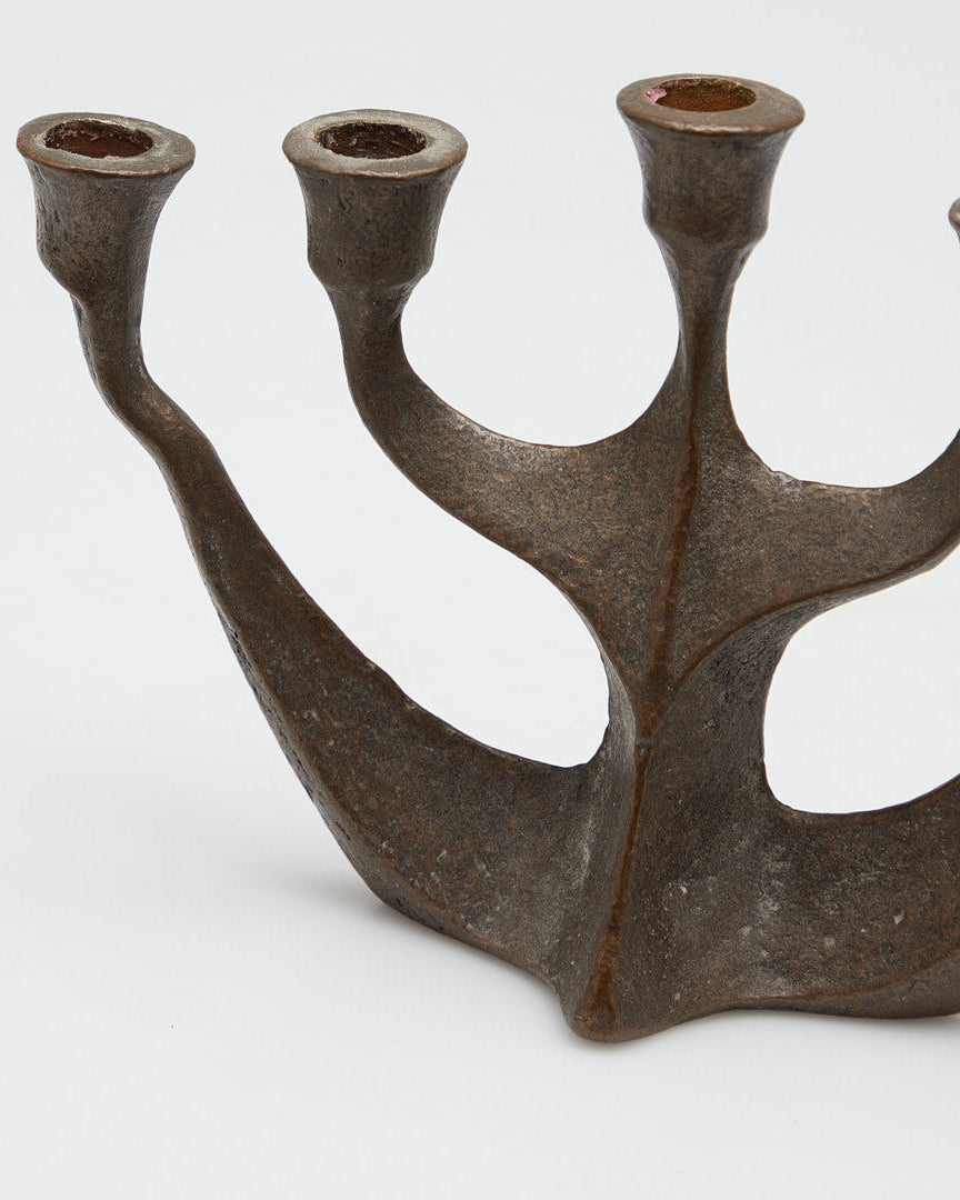 Brutalist ceramic candelabra detail showing curved branching arms