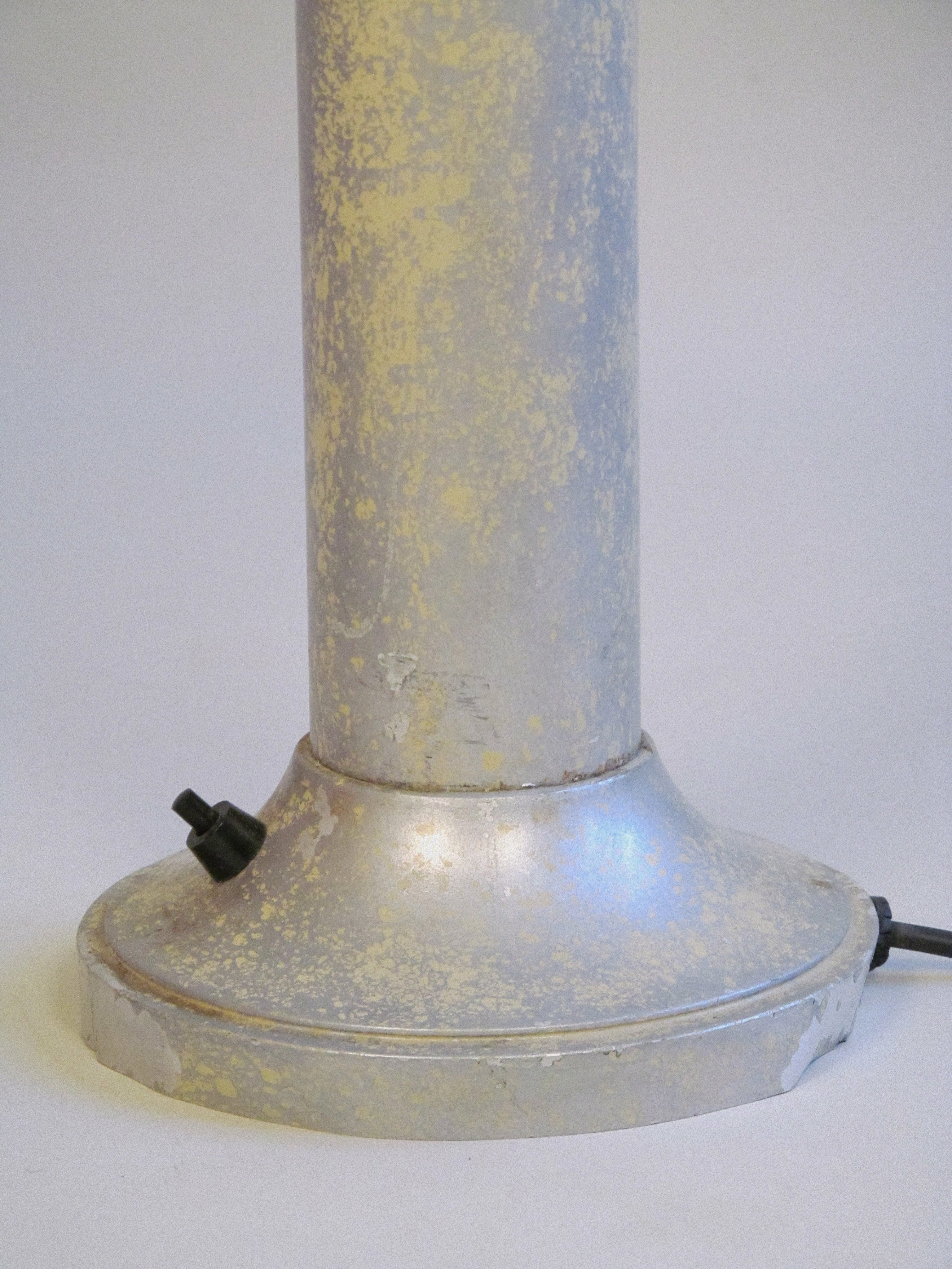 Architectural Uplighter c.1970 — close-up of weathered metal base