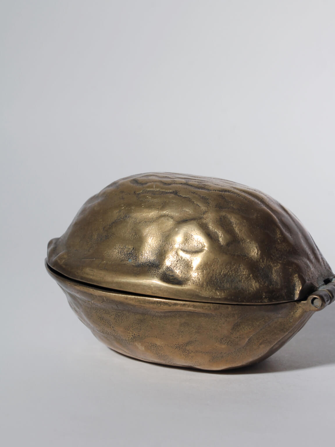 Vintage Brass Nutcracker Walnut, 1960s — top view of textured brass finish