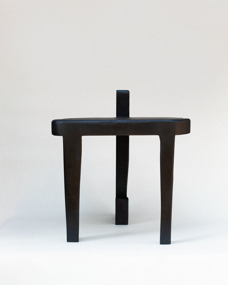 Sharie black wooden stool with minimalist three-leg design