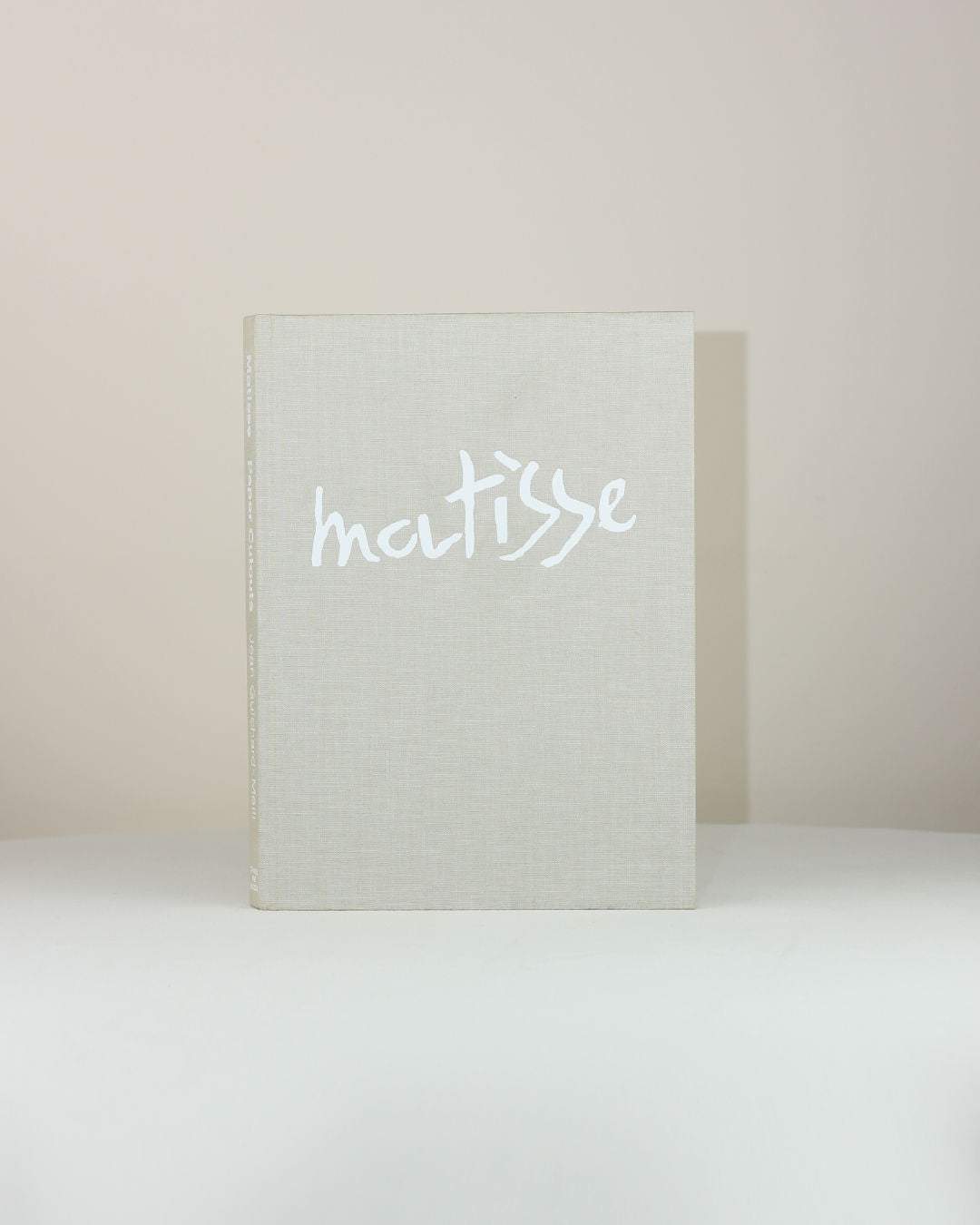 Matisse Paper Cutouts — front view of linen-covered art book