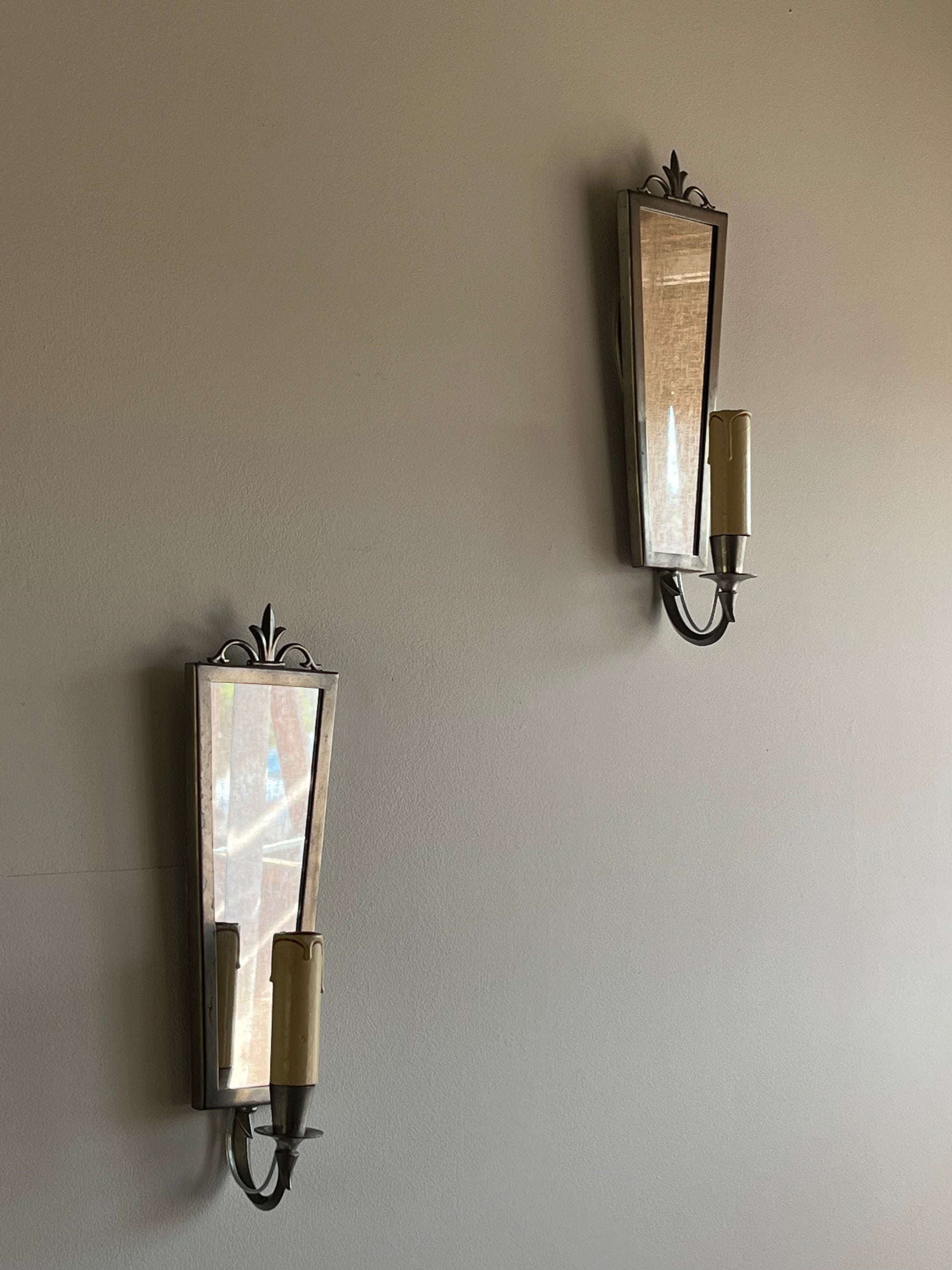 Swedish Grace Pewter Mirror & Sconce Set by Svenskt Tenn, 1931 — lifestyle setting