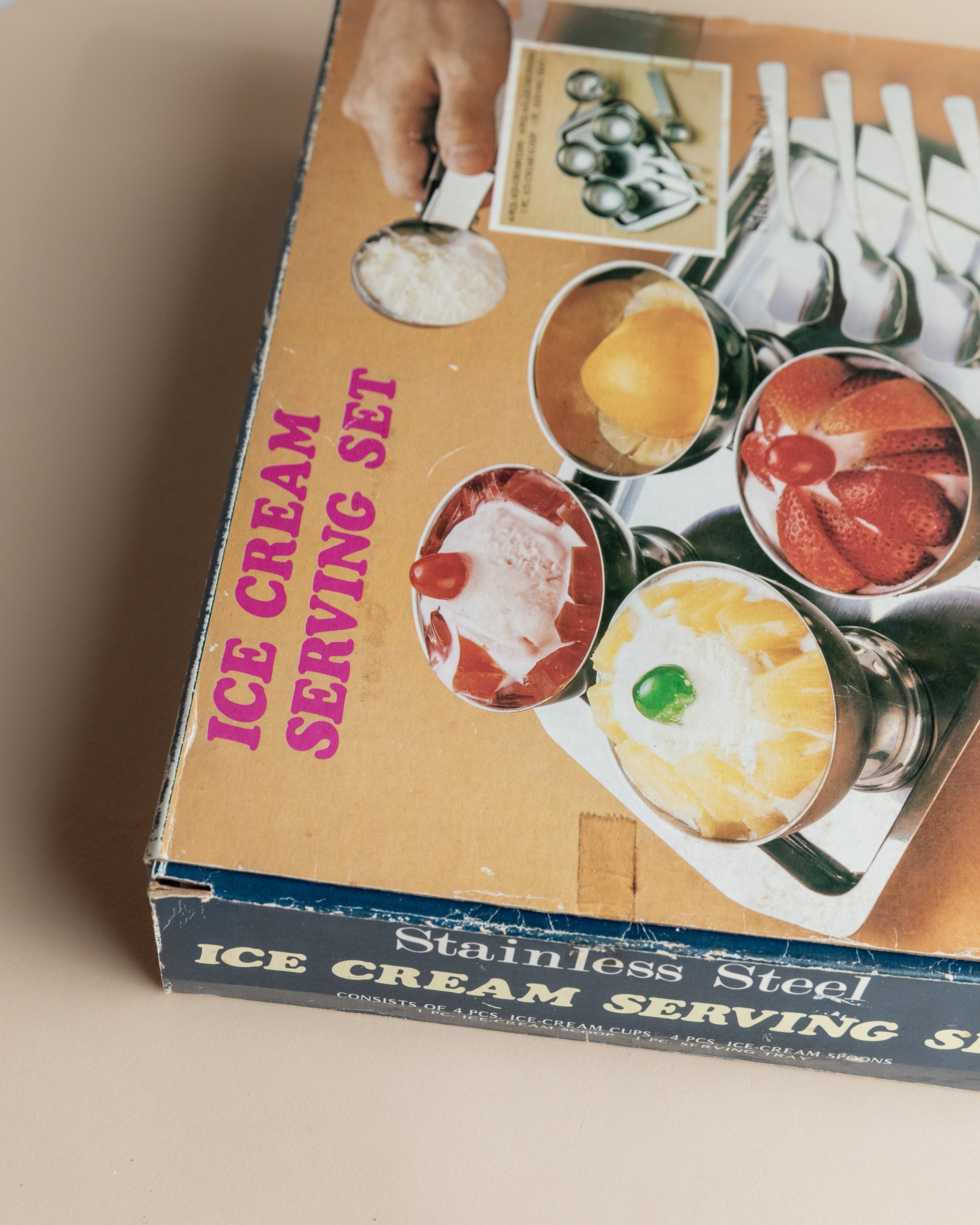 Vintage 1970s Ice Cream Serving Set for 4, Stainless Steel Cups, Spoons, Tray, Scoop — angled view of box with colorful ice c