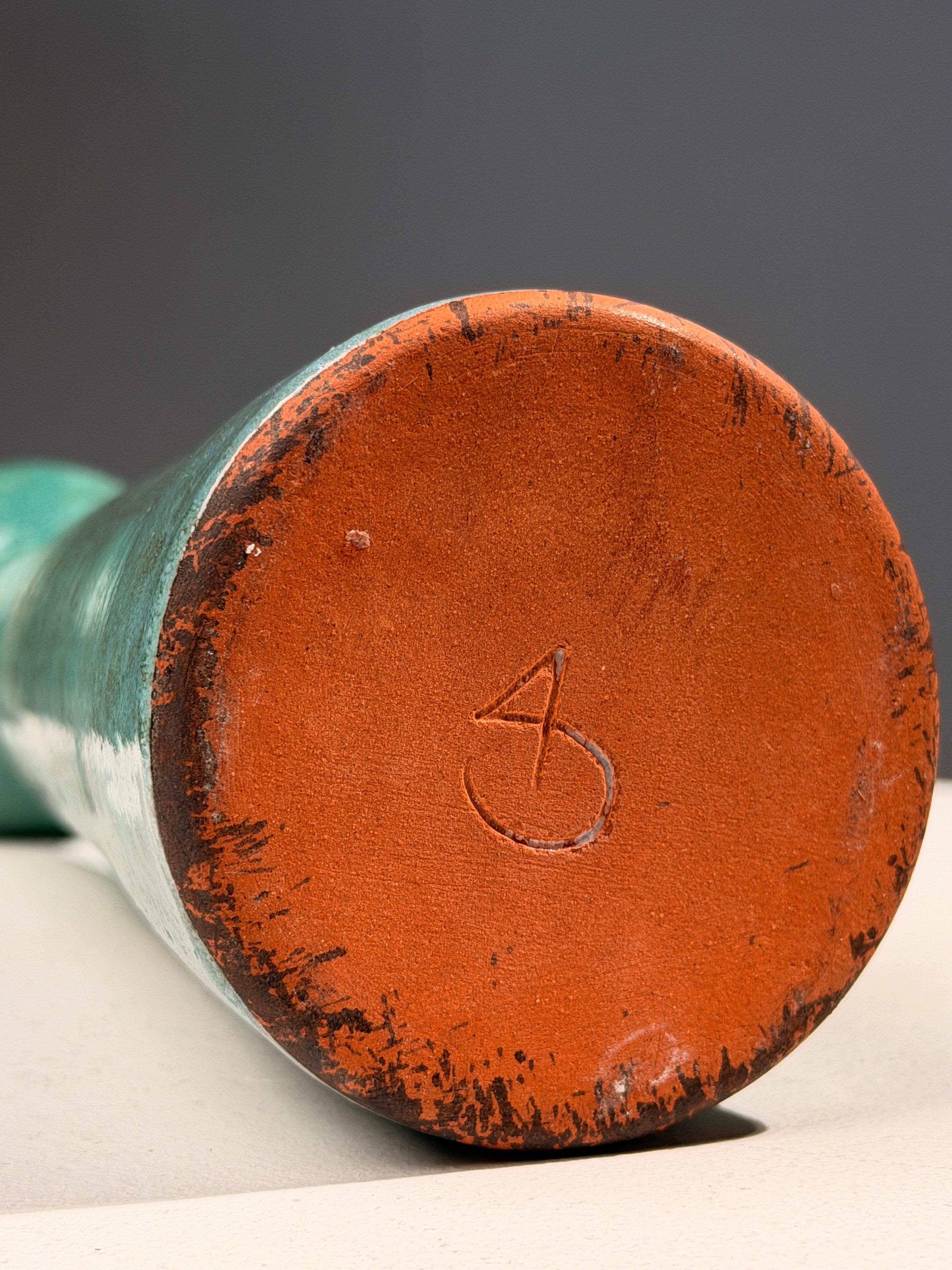 Elegant green glazed terracotta soliflore vase, circa 1960 — lifestyle setting