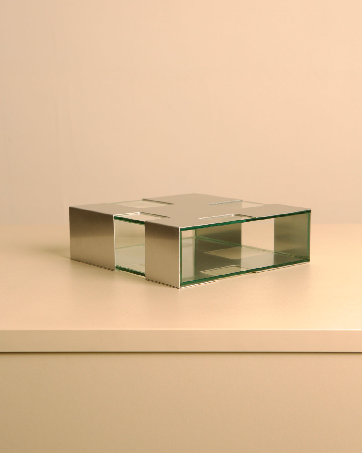 Italian brushed metal and glass vase, 1980s — side angle