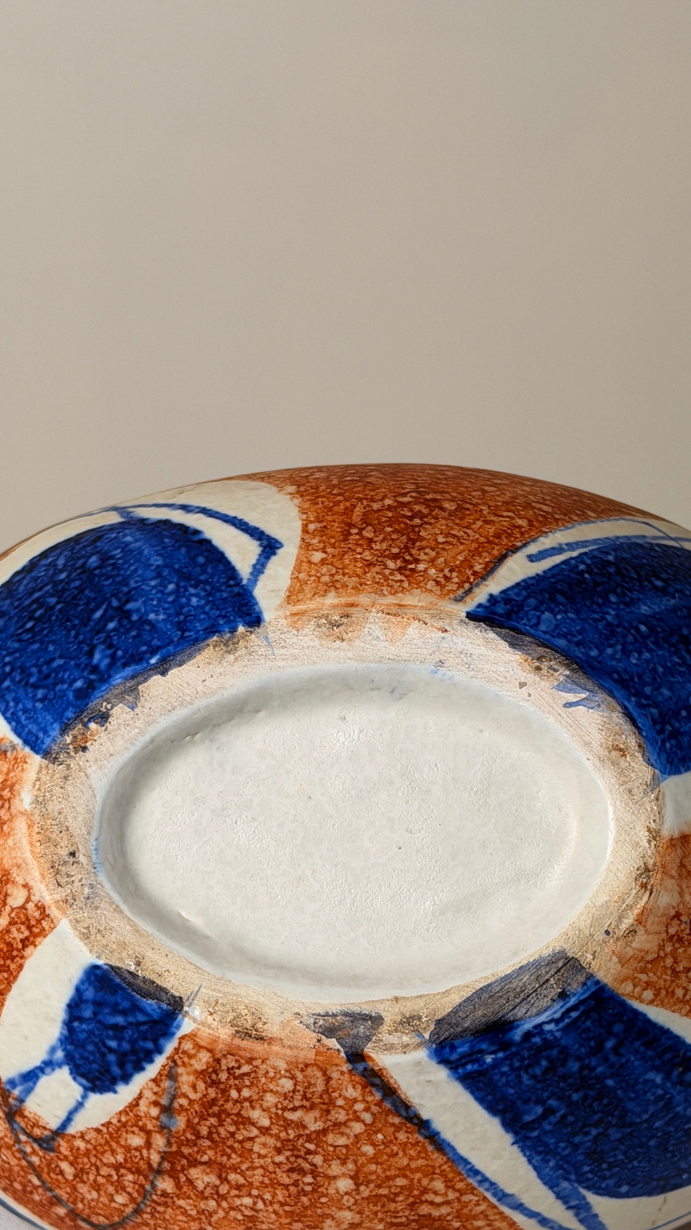 Ceramic Pitcher, Italy, circa 1950. — top view of colorful painted surface