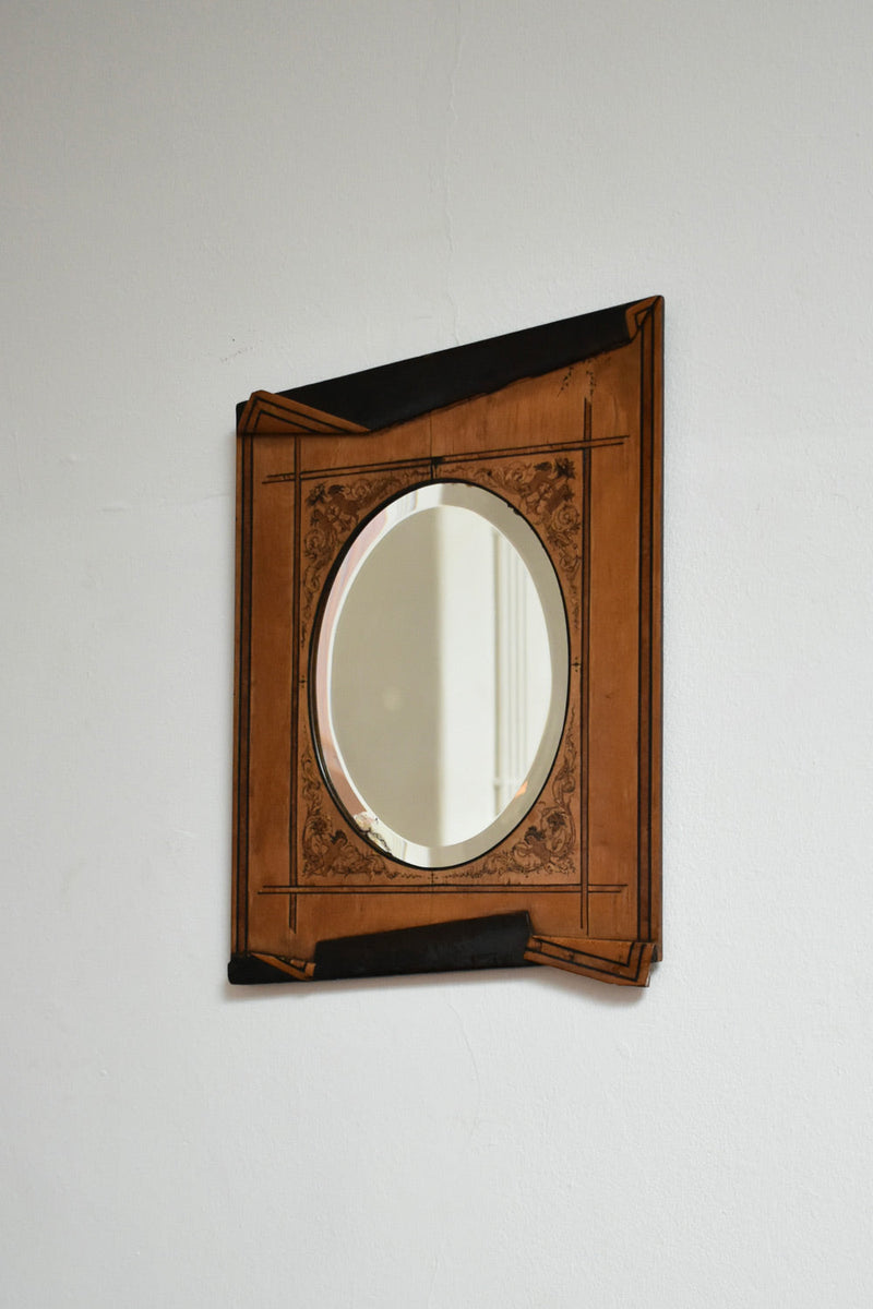 Wooden Edges Simulating Folds Mirror, XIXth c. — detail of wooden frame against white wall
