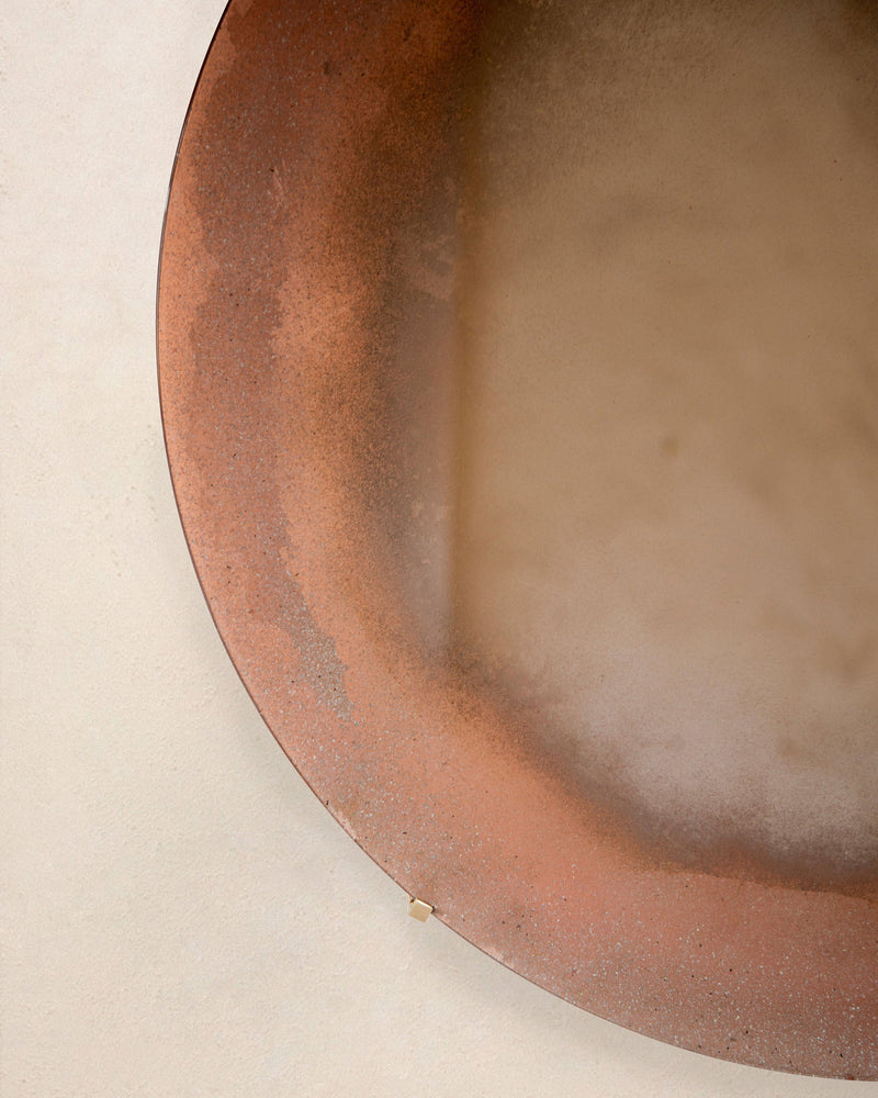 Sandstorm' Mirror — close-up of textured bronze edge
