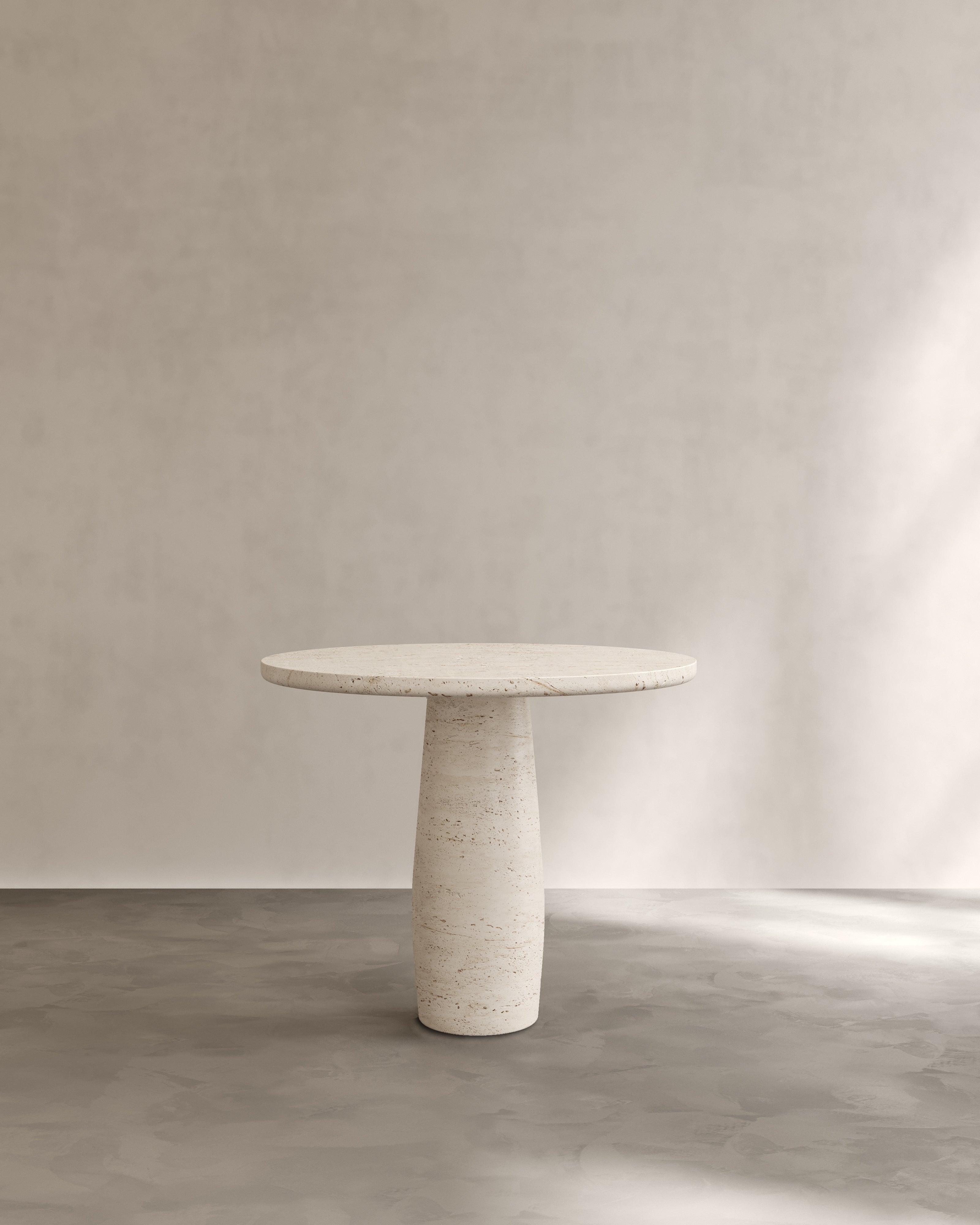 Raffaella Table I — back view of round stone dining table