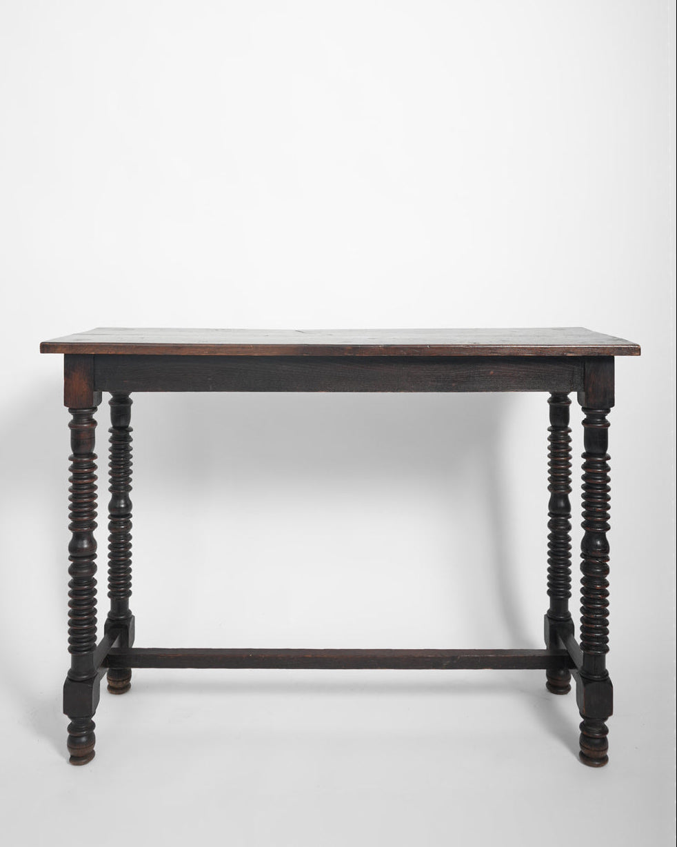 Console de table en bois tourné ébénisé espagnol, XIXe siècle.