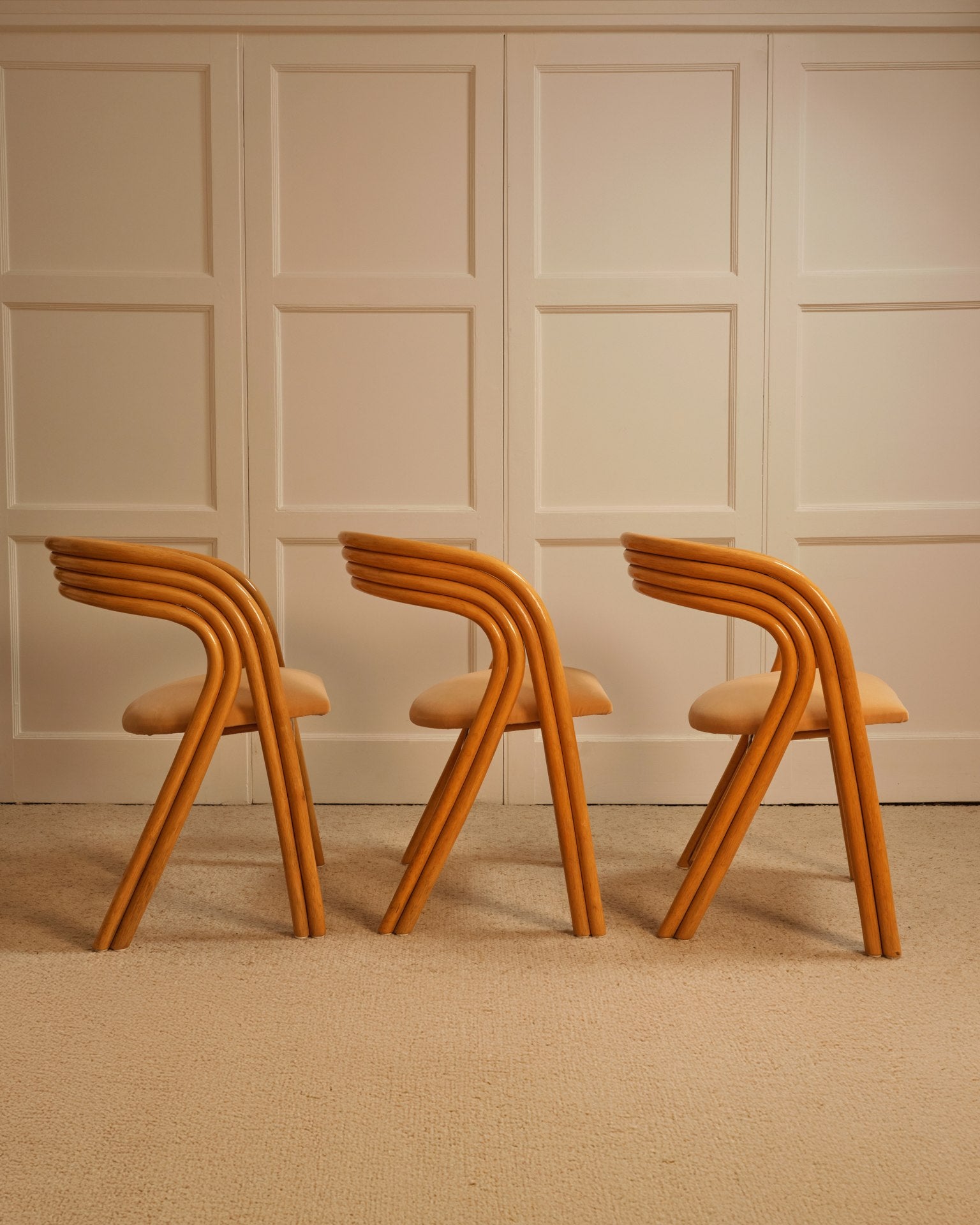 Curved bentwood design detail of 1970s Axel Enthoven chairs