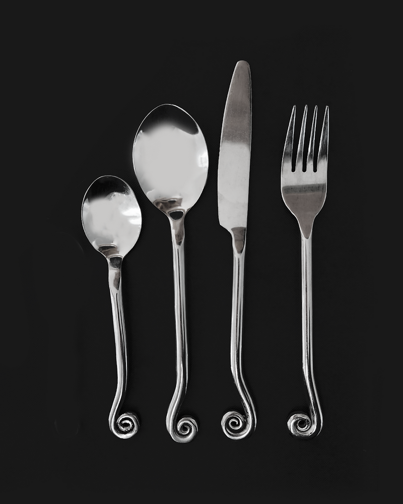 Set of 4 stainless steel cutlery pieces with spiral handle design