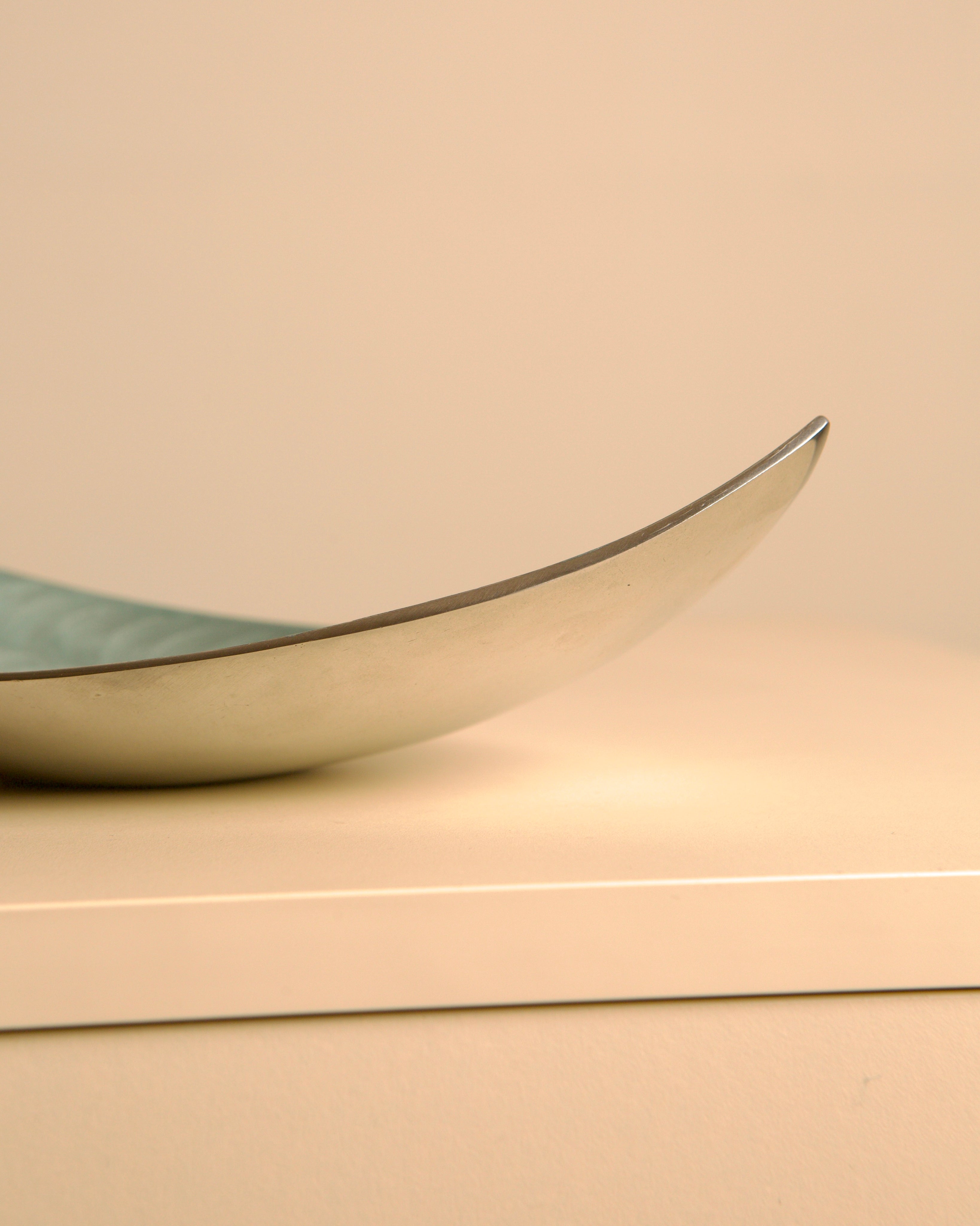 “Galassia” aluminum catchall by Brandani, 1980s — lifestyle setting