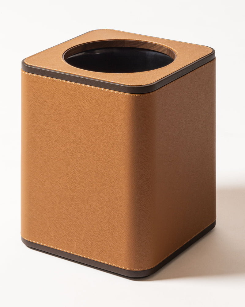 Tan leather wastepaper bin with dark interior by Giobagnara