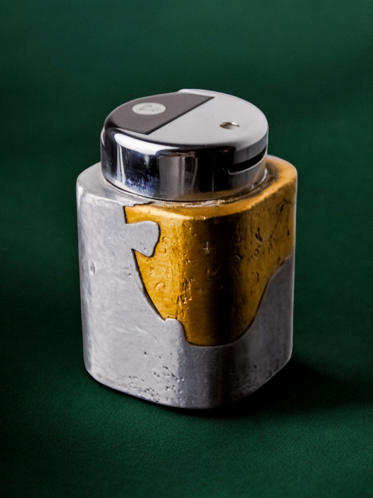 Brutalist lighter by Art3, Brass and aluminum, 1970, Spain — close-up showing textured metal surfaces