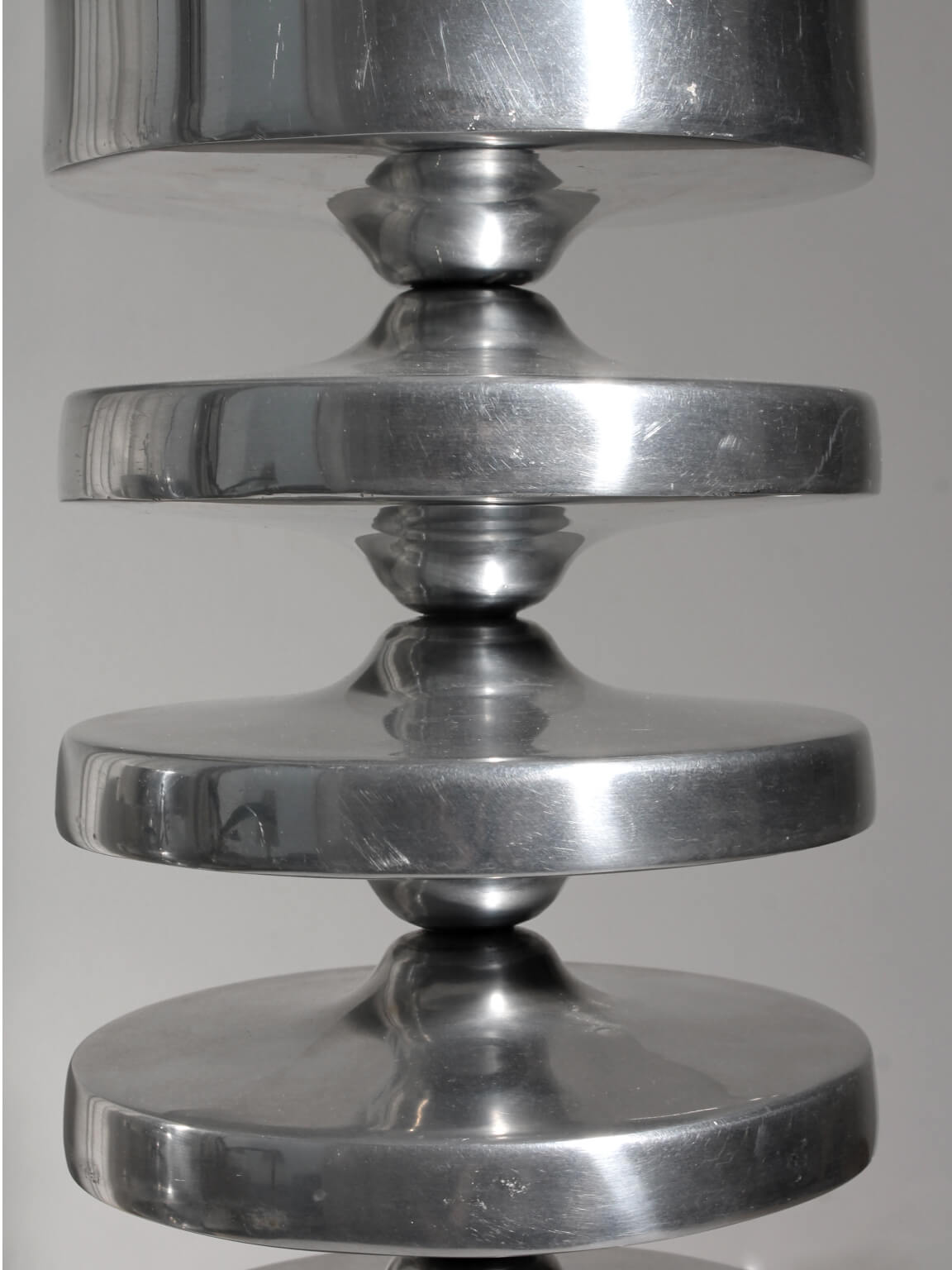 Pair Of Aluminum Contemporary Rimmed Stands — side angle