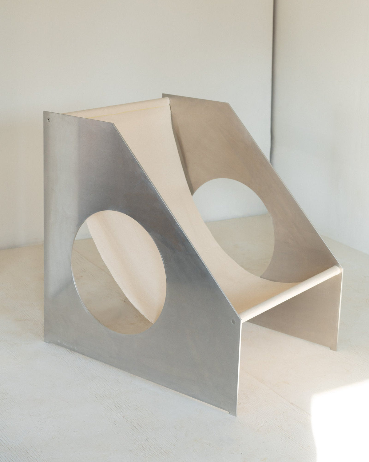 Aluminium Hublot Chair — side angle