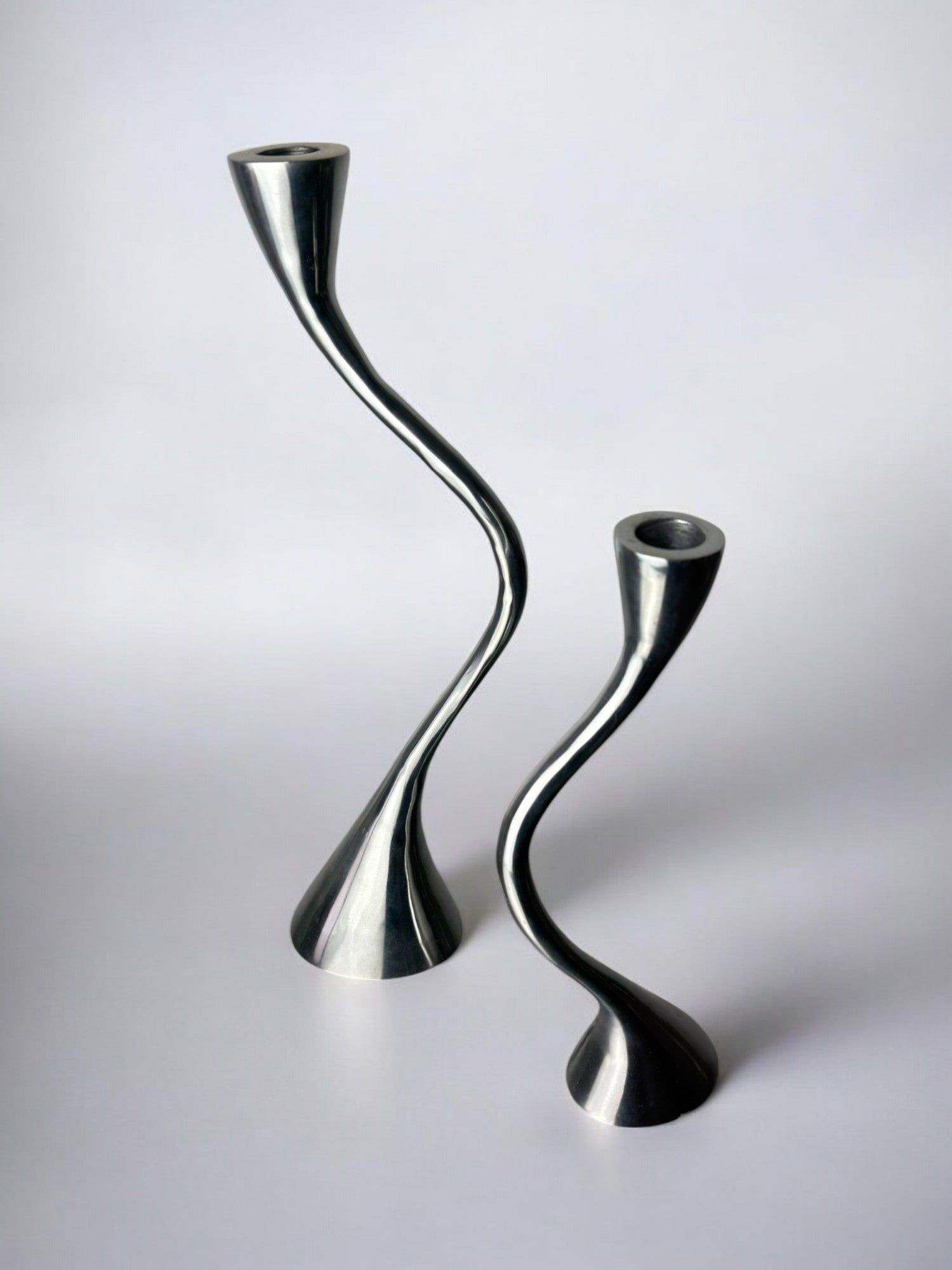 Pair of Zigzag Candleholders, Solid Aluminium, Spain, 1980s — angled view on neutral background
