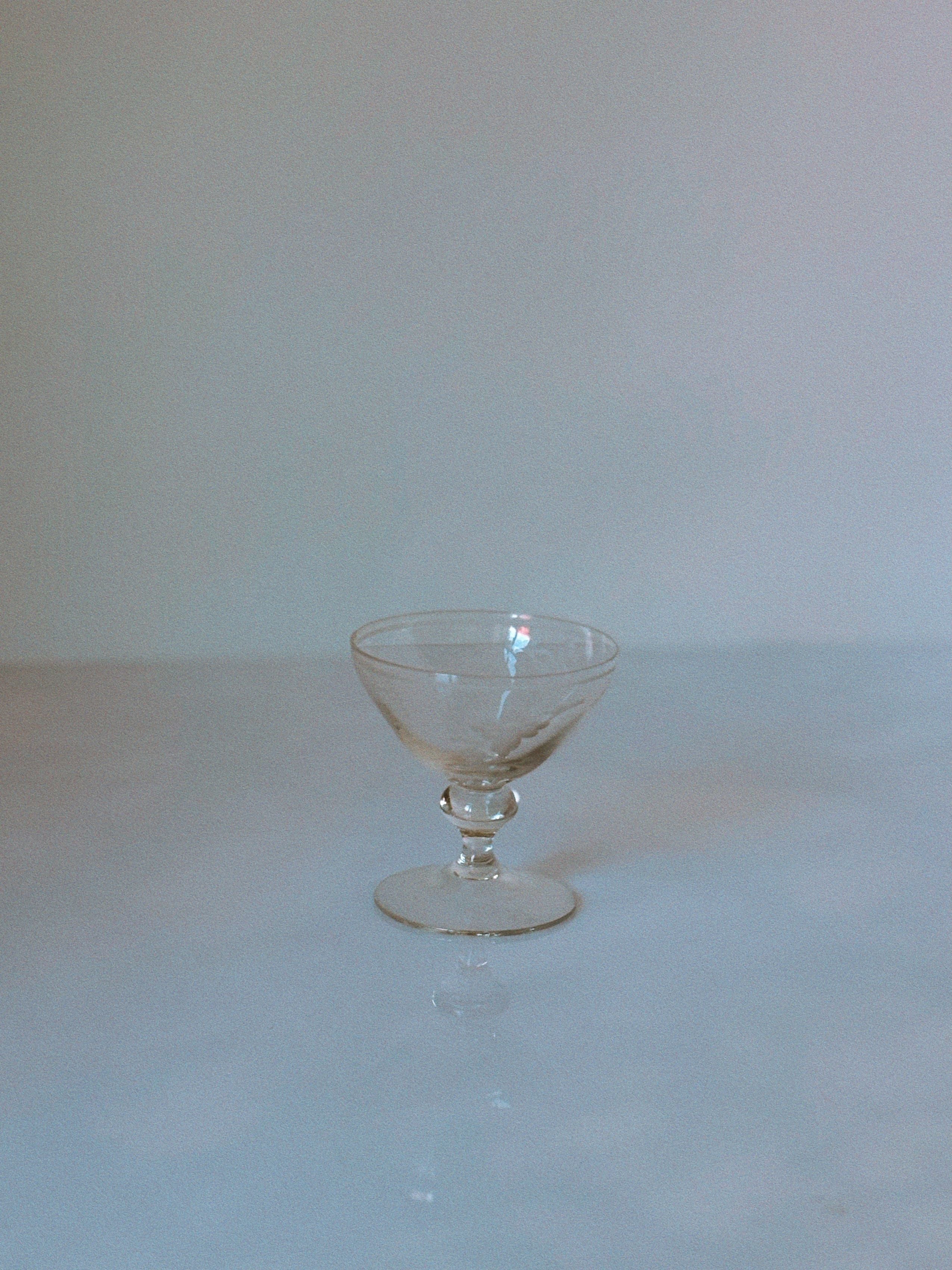 Single etched floral dessert wine glass with decorative stem
