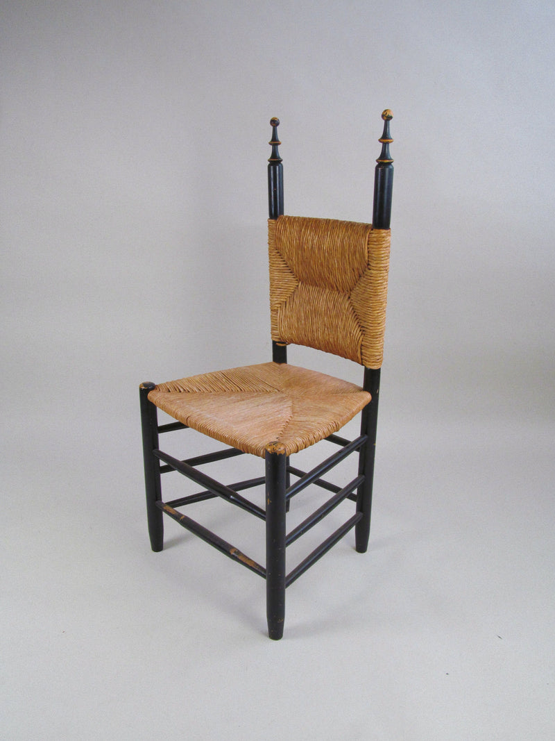 Set of Four European Rush-Back Chairs c.1950. — close-up of rush seat and black wooden frame