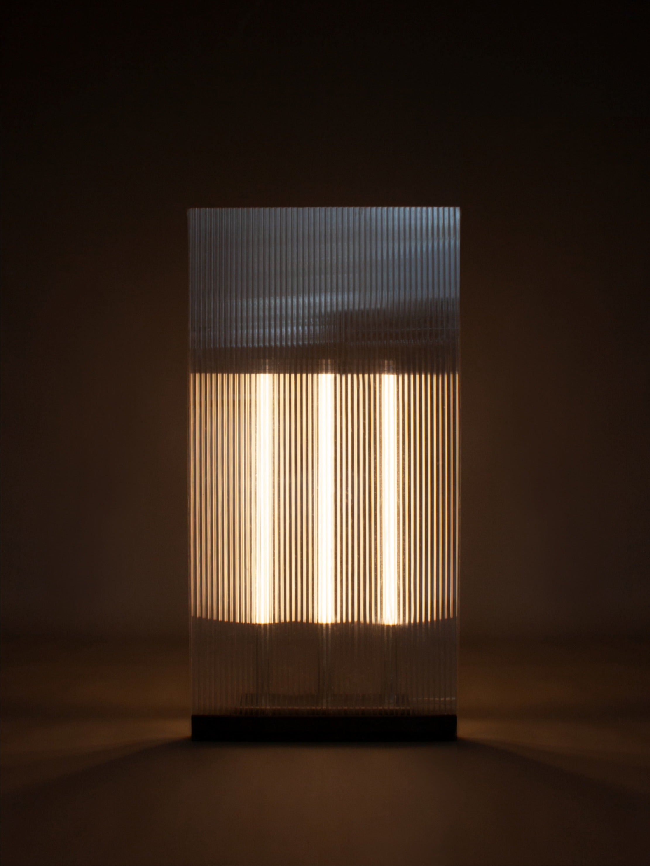 POLY-C-3 Floor Lamp — side angle showing clear ribbed acrylic design
