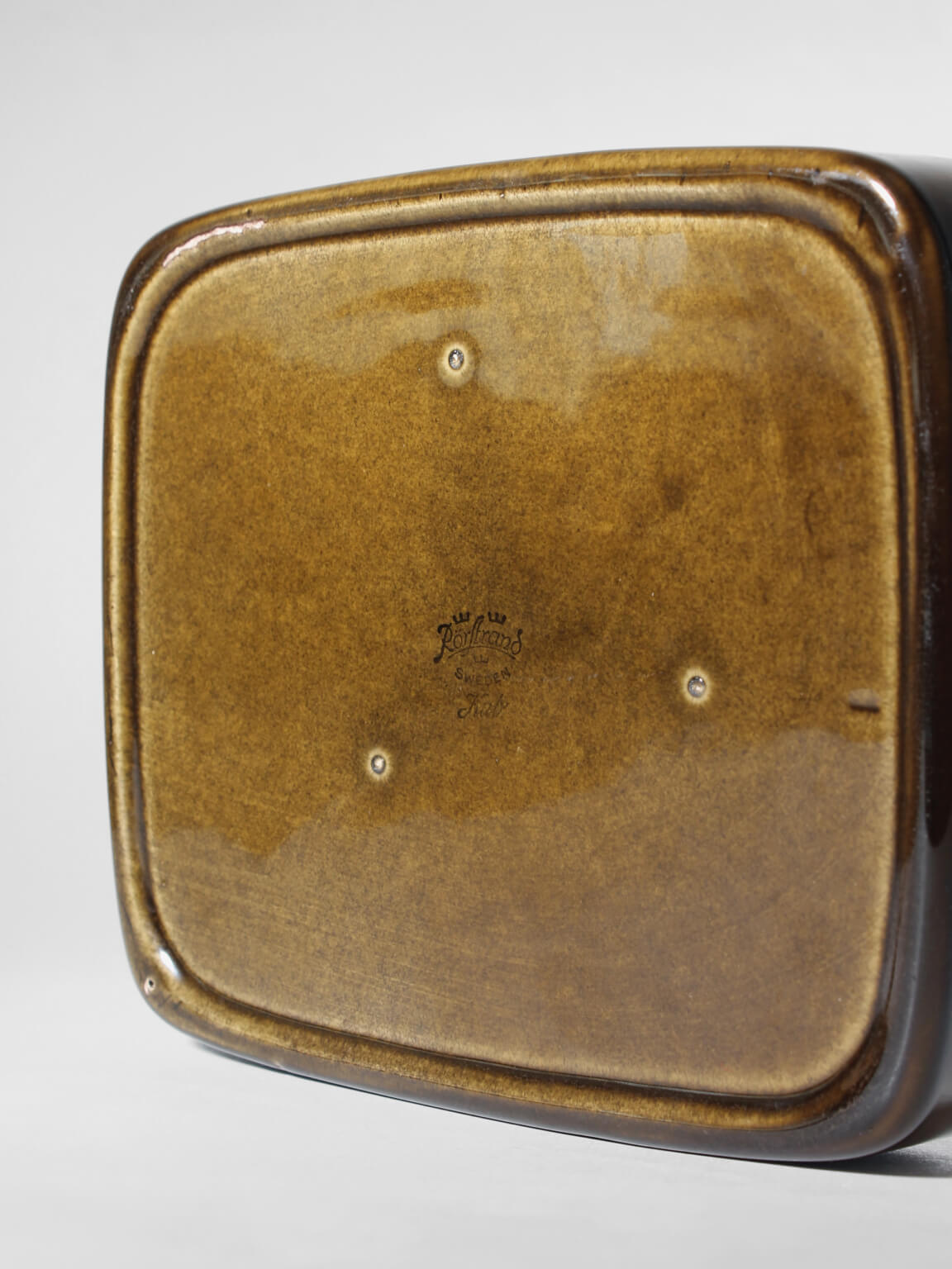 Gunnar Nylund Ceramic Glazed "Kub" Bowl, For Rörstrand, 1960s, Sweden — top view of glossy brown ceramic base