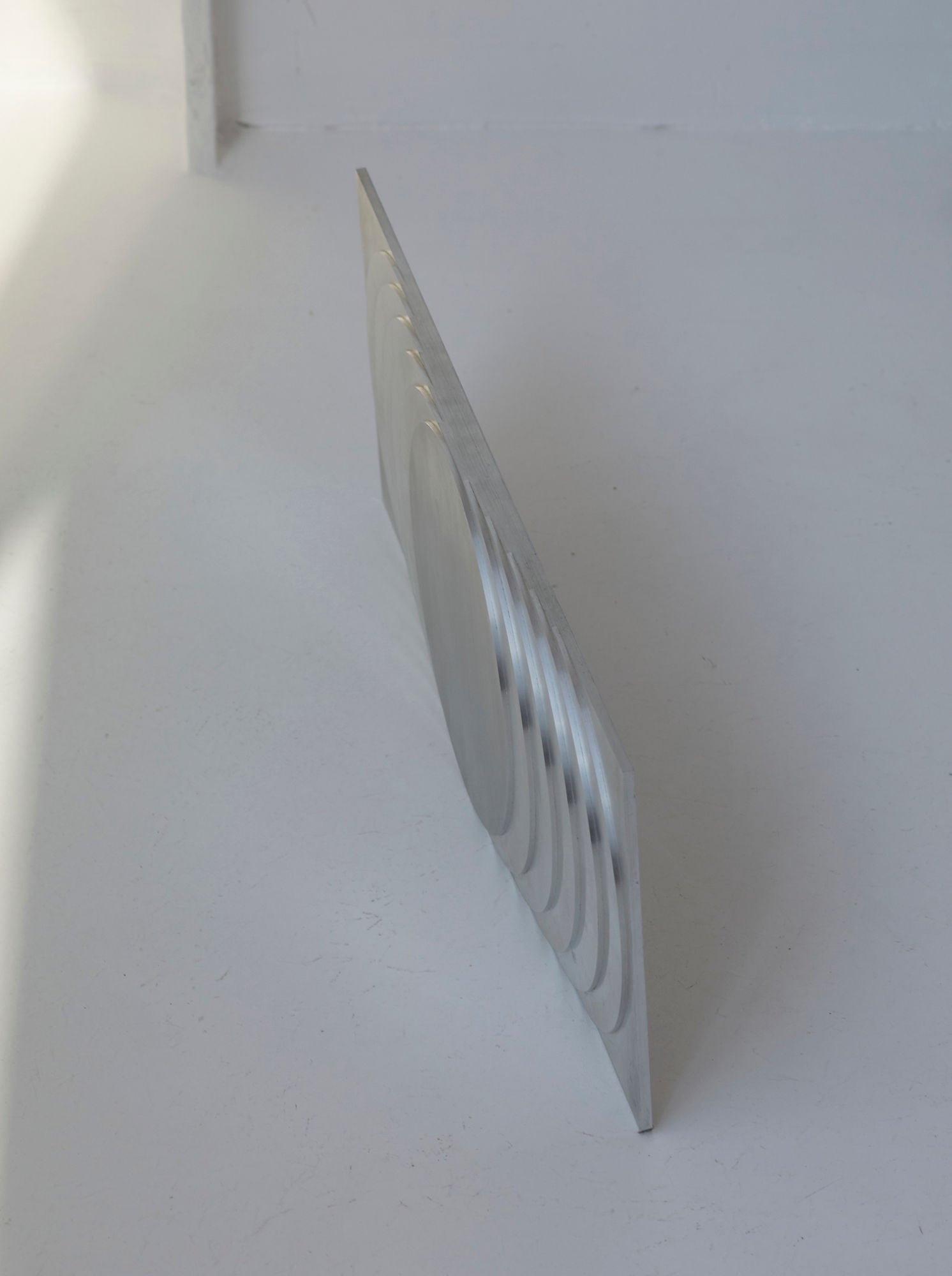 ‘The Sun’s Path' Steel Wall Sculpture By Anonymous French Artist Circa 1970 — side angle showing polished steel surface