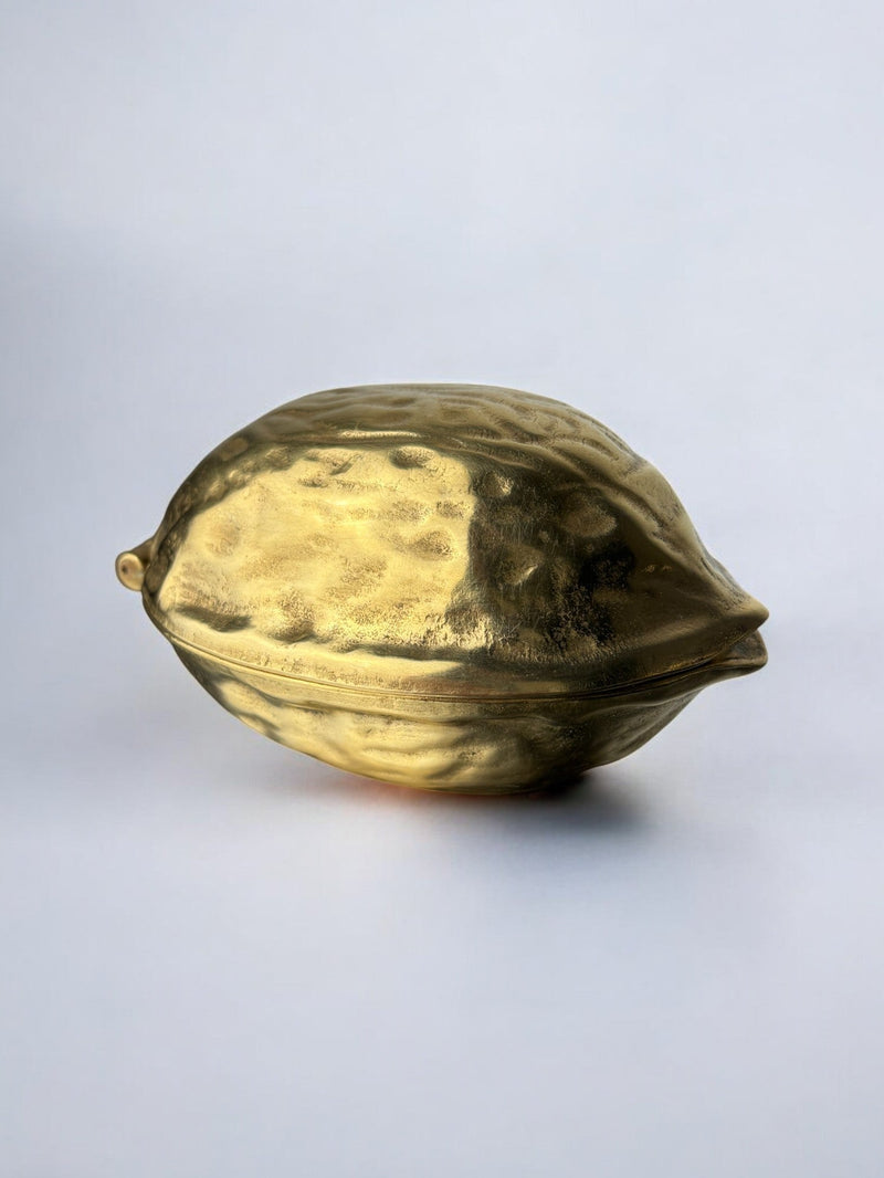 Walnut Shaped Nut Cracker in Brass, Italy 1970s — close-up of polished brass surface