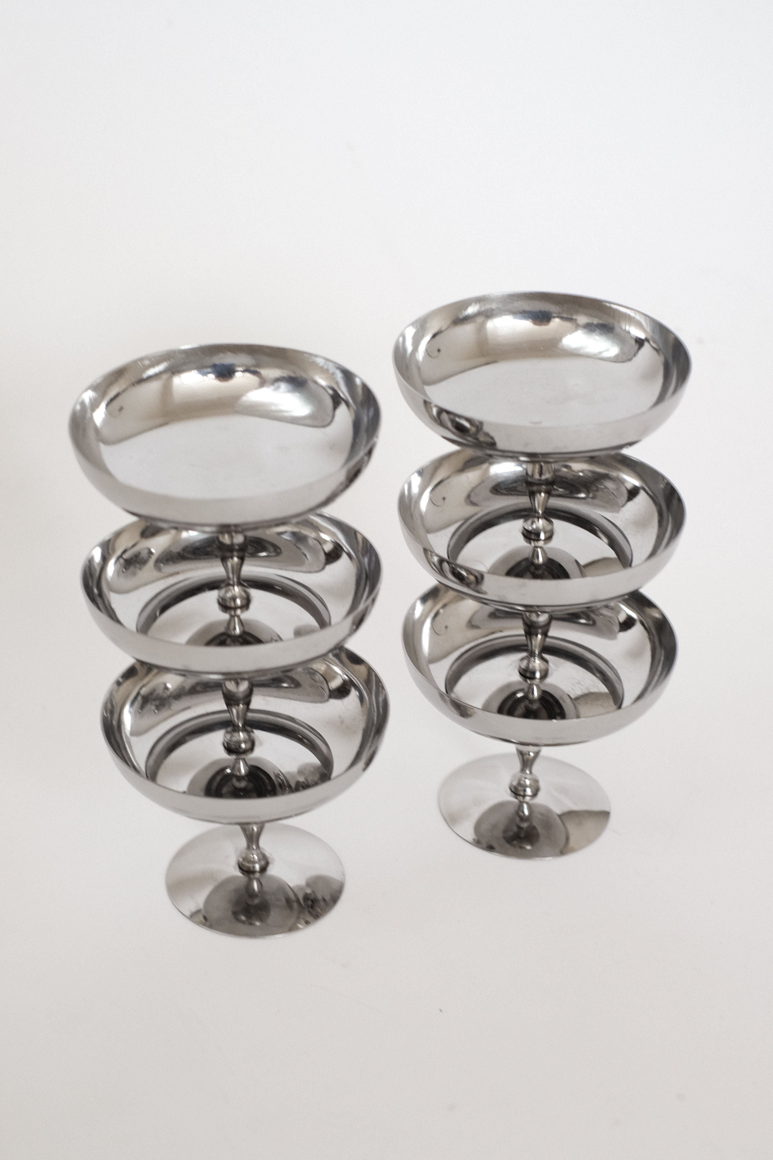 Set of 6 Ice Coupes — side angle showing polished metal finish