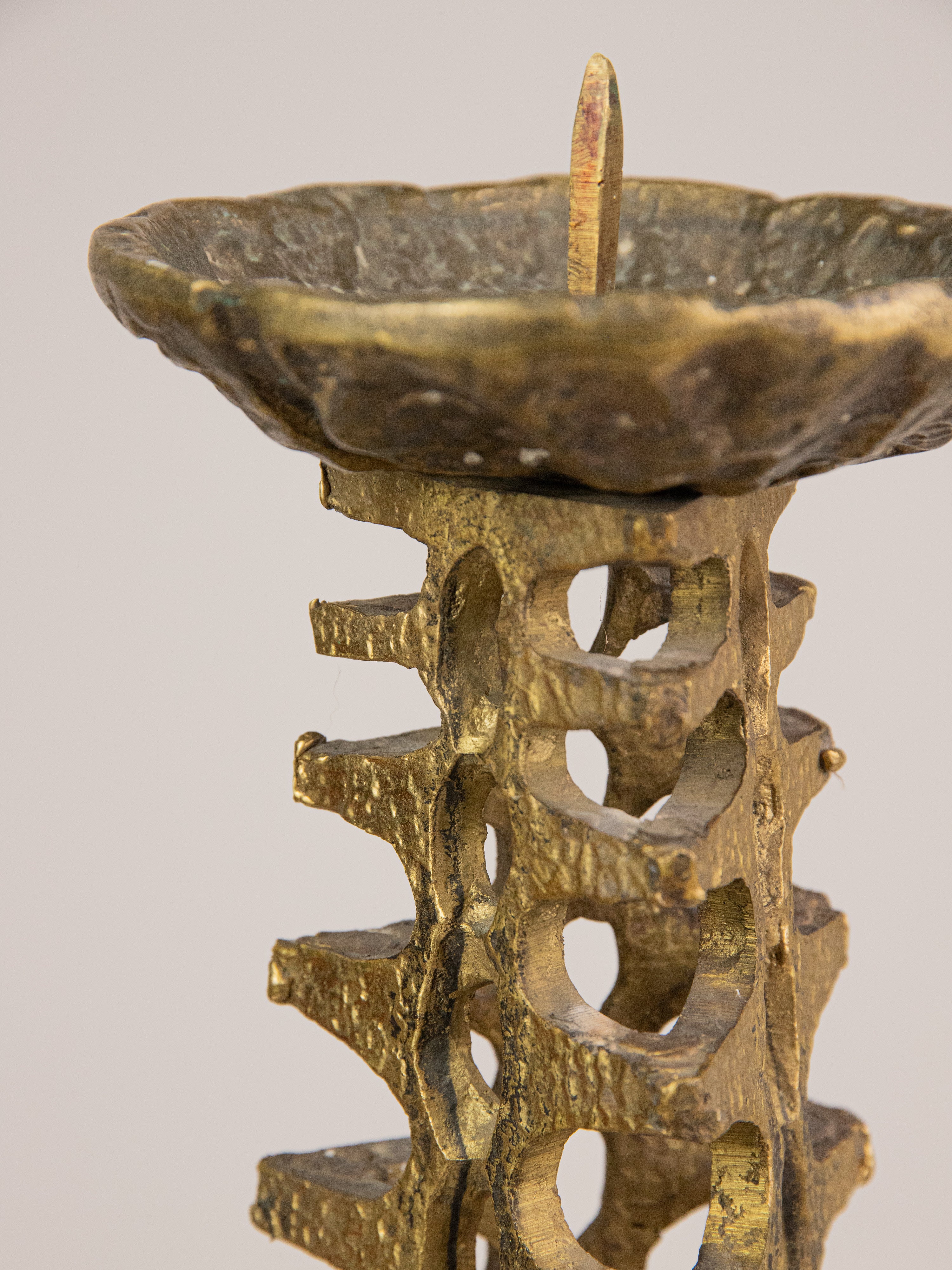 Tall Brutalist Bronze Floor Candleholder — side angle highlighting textured bronze design