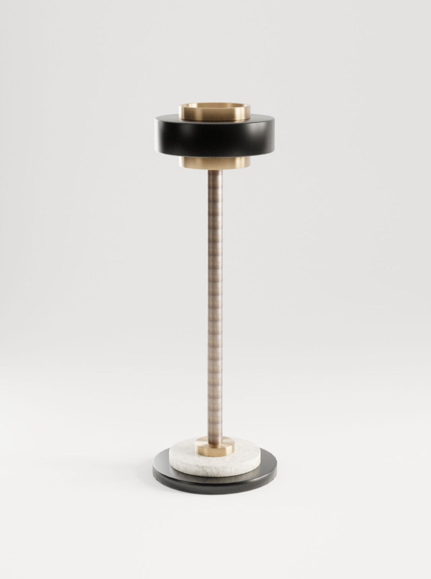 Madmen Ashtray — close-up of black and brass materials
