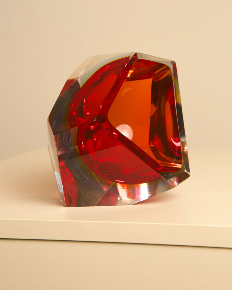 Large red glass vide poche by Flavio Poli showing curved form