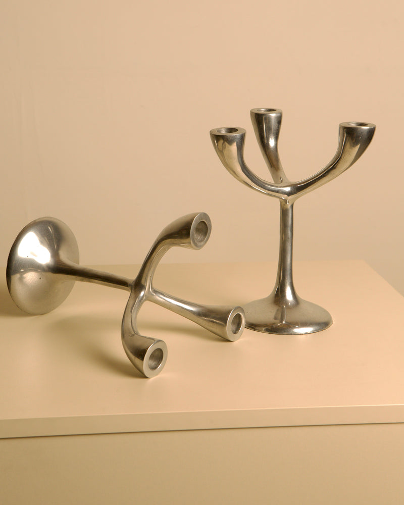 Pair of Italian "Tree" candlesticks from the 70s — close-up of polished metal finish