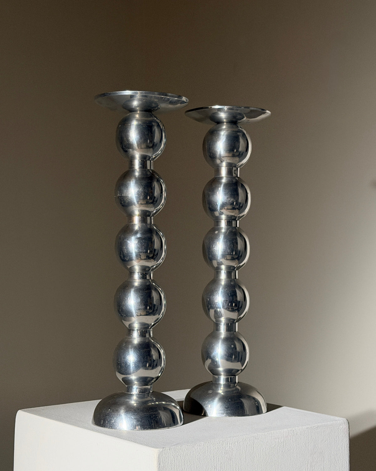 Pair of large aluminum candlesticks, France, circa 1970. by Figuresdesign | The Oblist