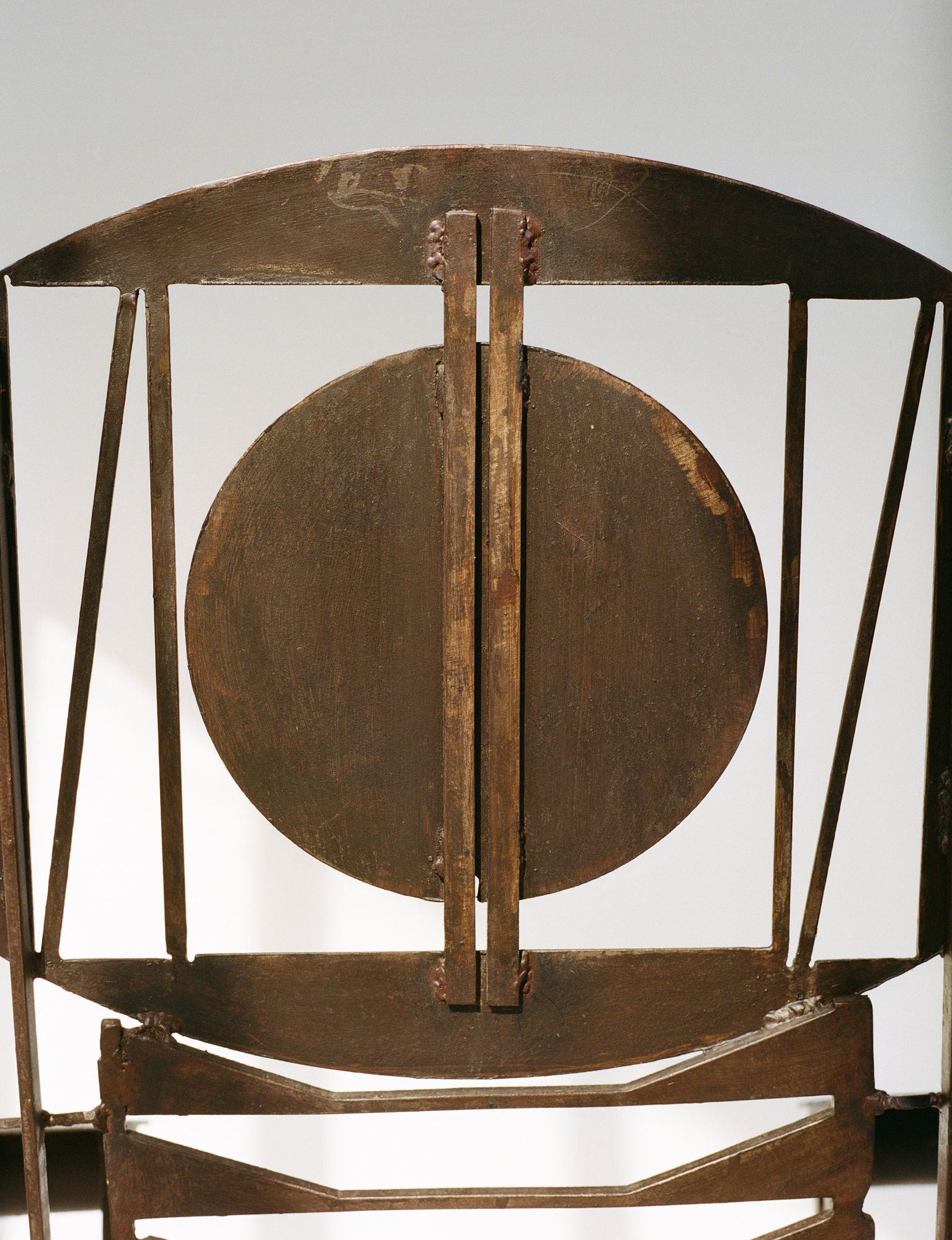 Functional Sculpture / Vintage Artist Arm Chair from Nigeria C. 1960-70 — close-up of textured metal backrest