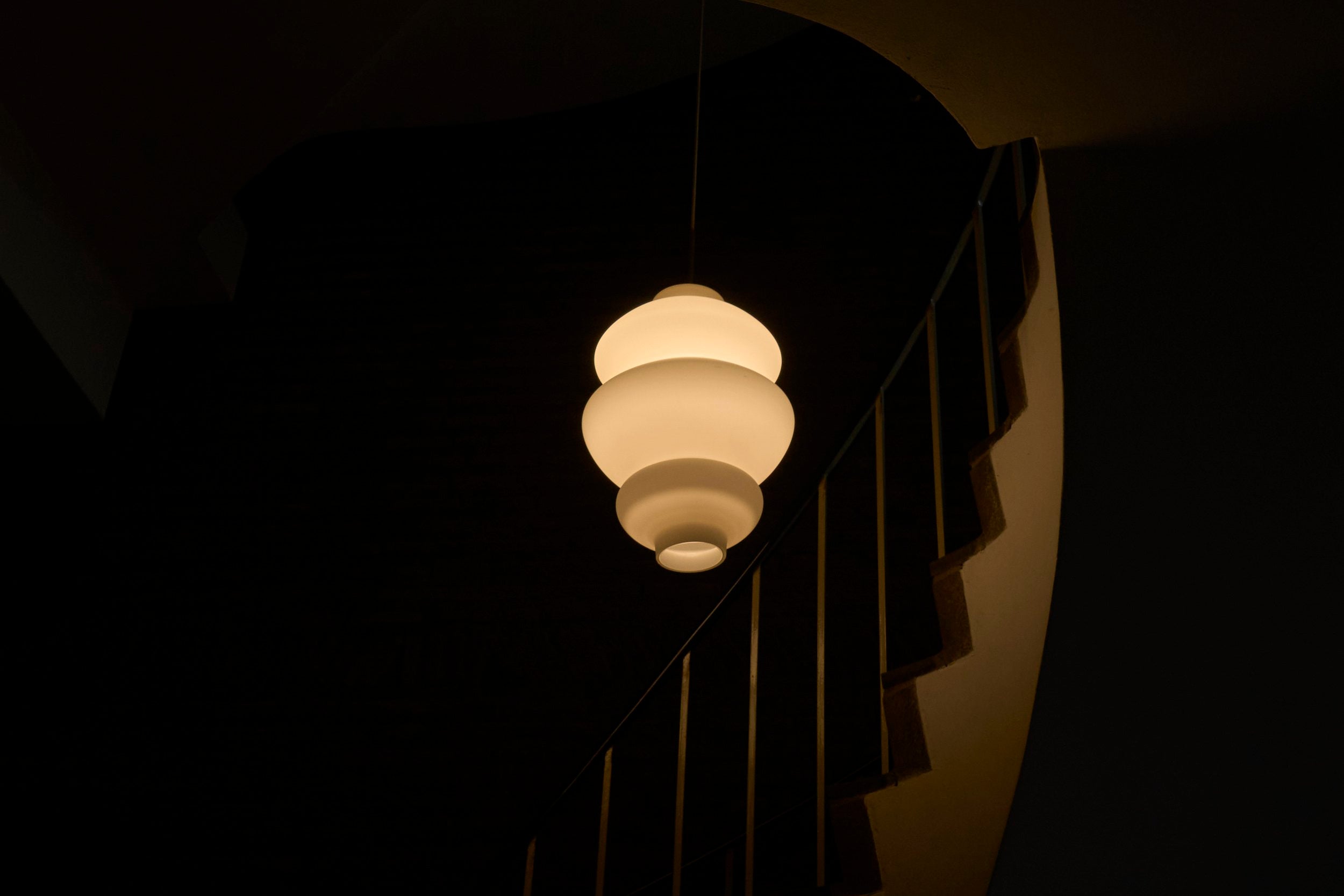 Large Sculptural Mid-Century Pendant Lamp in Opaline Glass 1960 — lifestyle setting