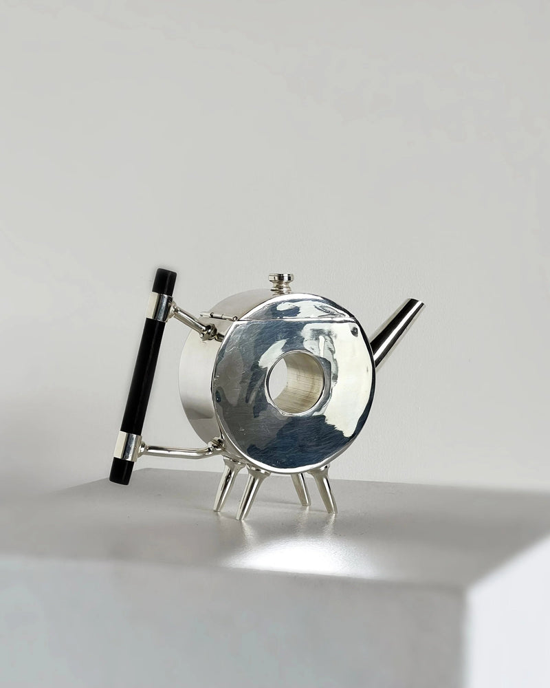 Christopher Dresser ornate circular teapot by Porter Studio | The Oblist — polished metal, modern design
